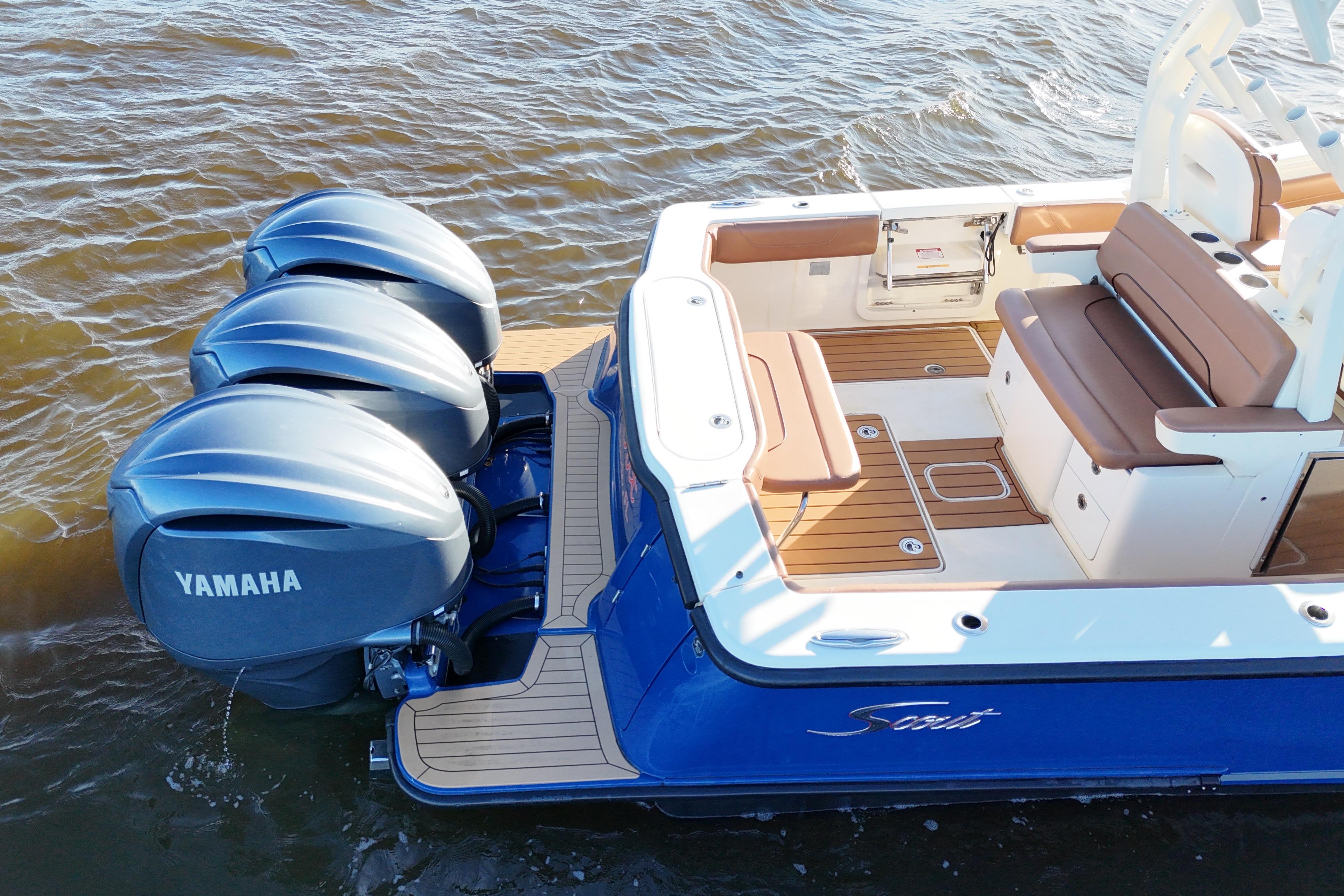 2017 Scout 350 LXF boat with Yamaha engines on water.