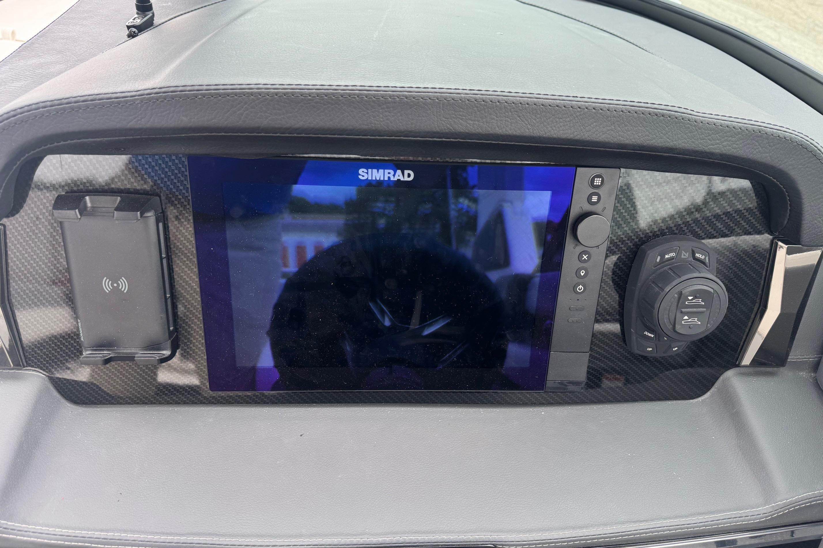 Dashboard of 2026 Chaparral 8 SSX with Simrad display and controls.