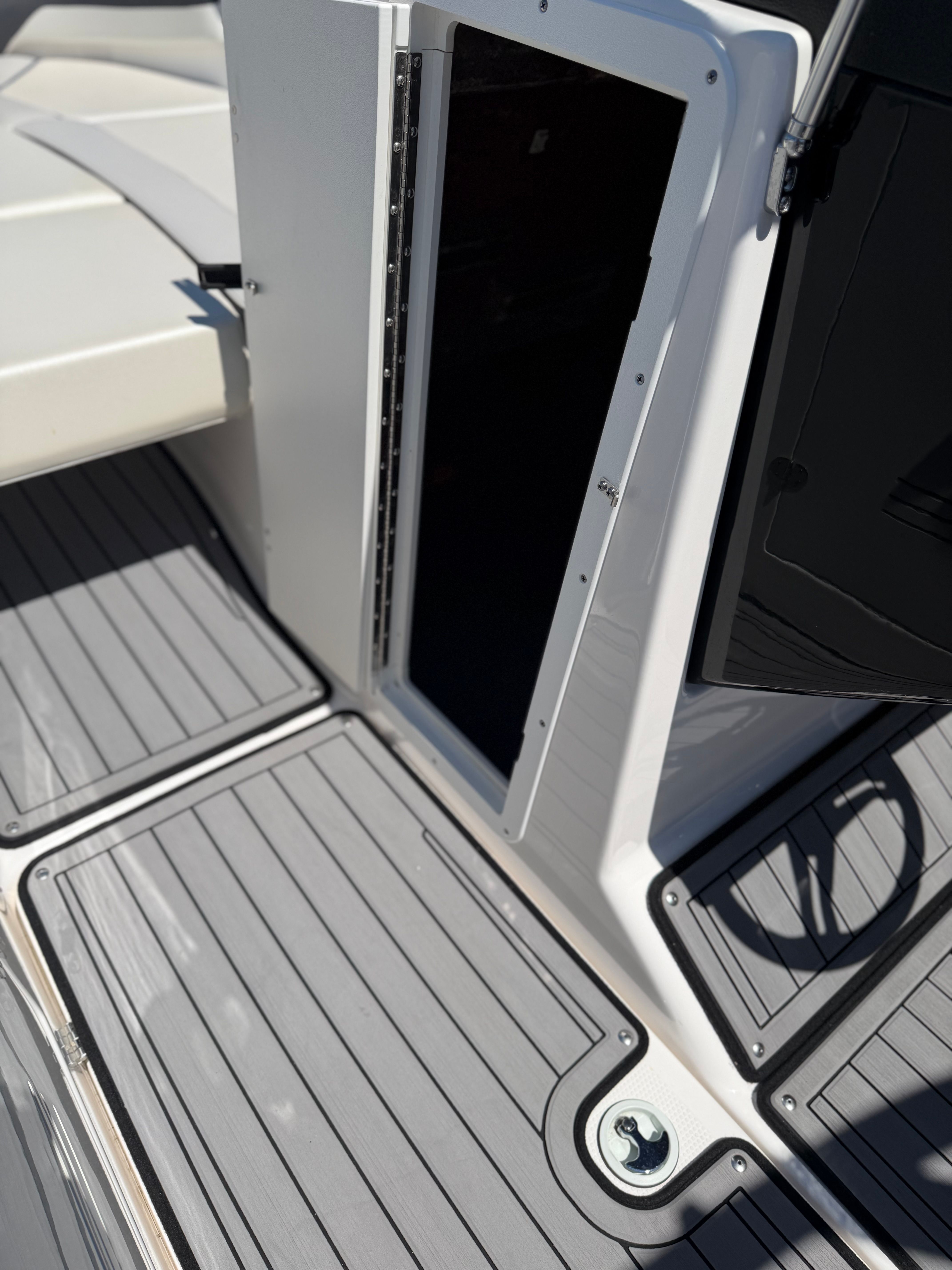 Close-up of the deck on a 2018 Yamaha 242 Limited S with gray flooring panels.