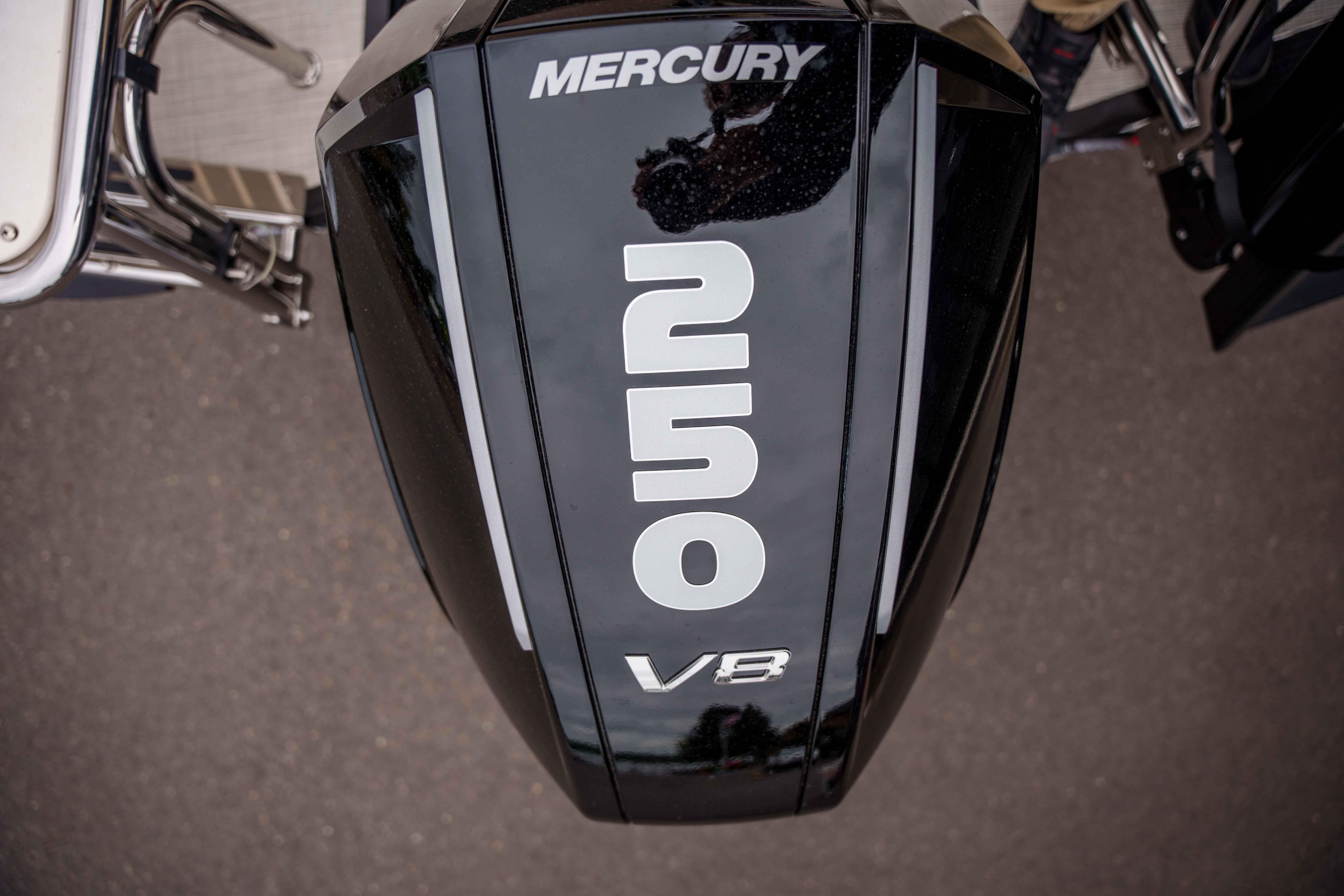Mercury 250 V8 engine on 2026 Harris Sunliner 230 boat, top view.