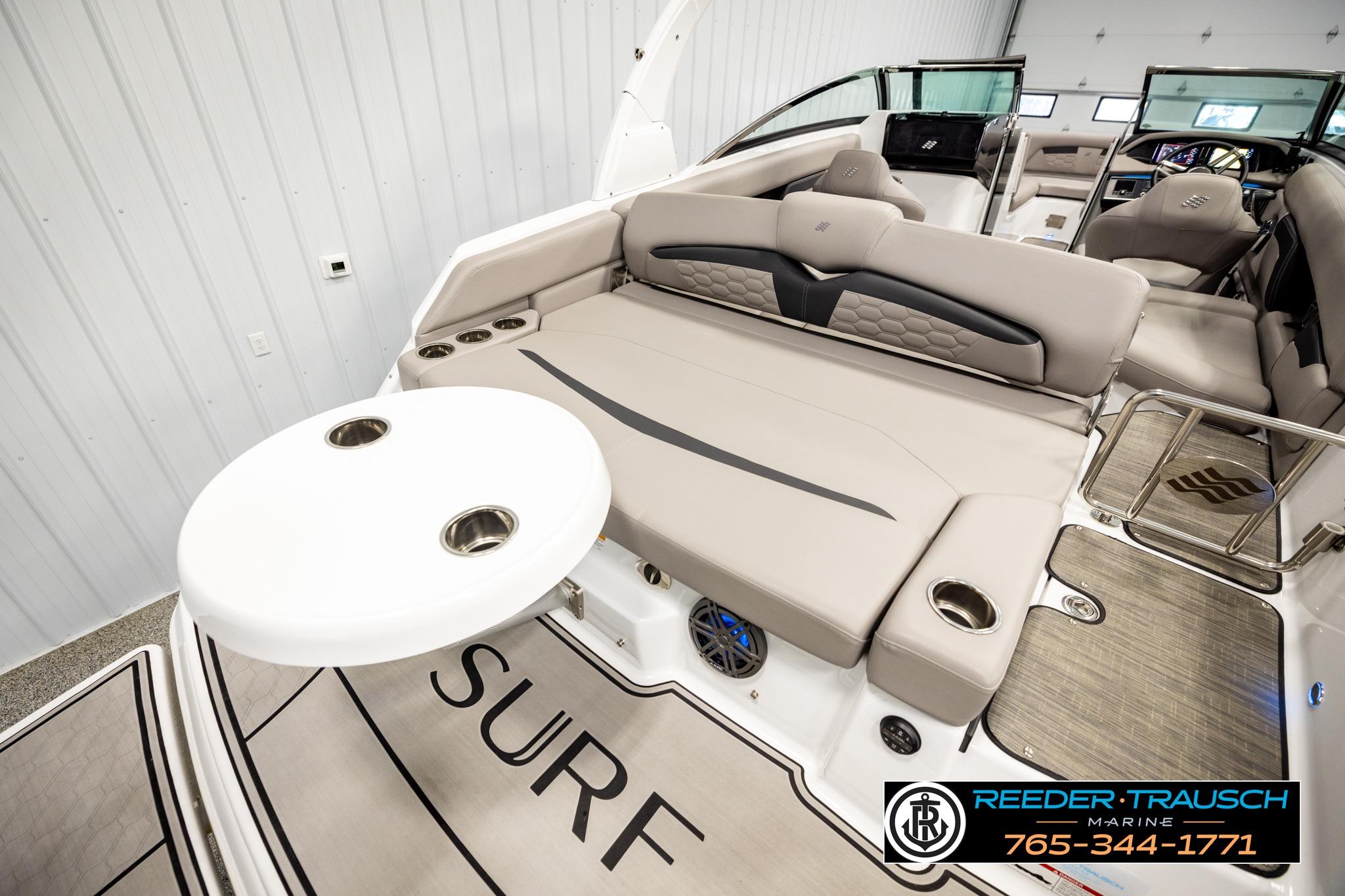 2024 FOURWINNS HD5 Surf boat interior with luxurious seating and modern design.