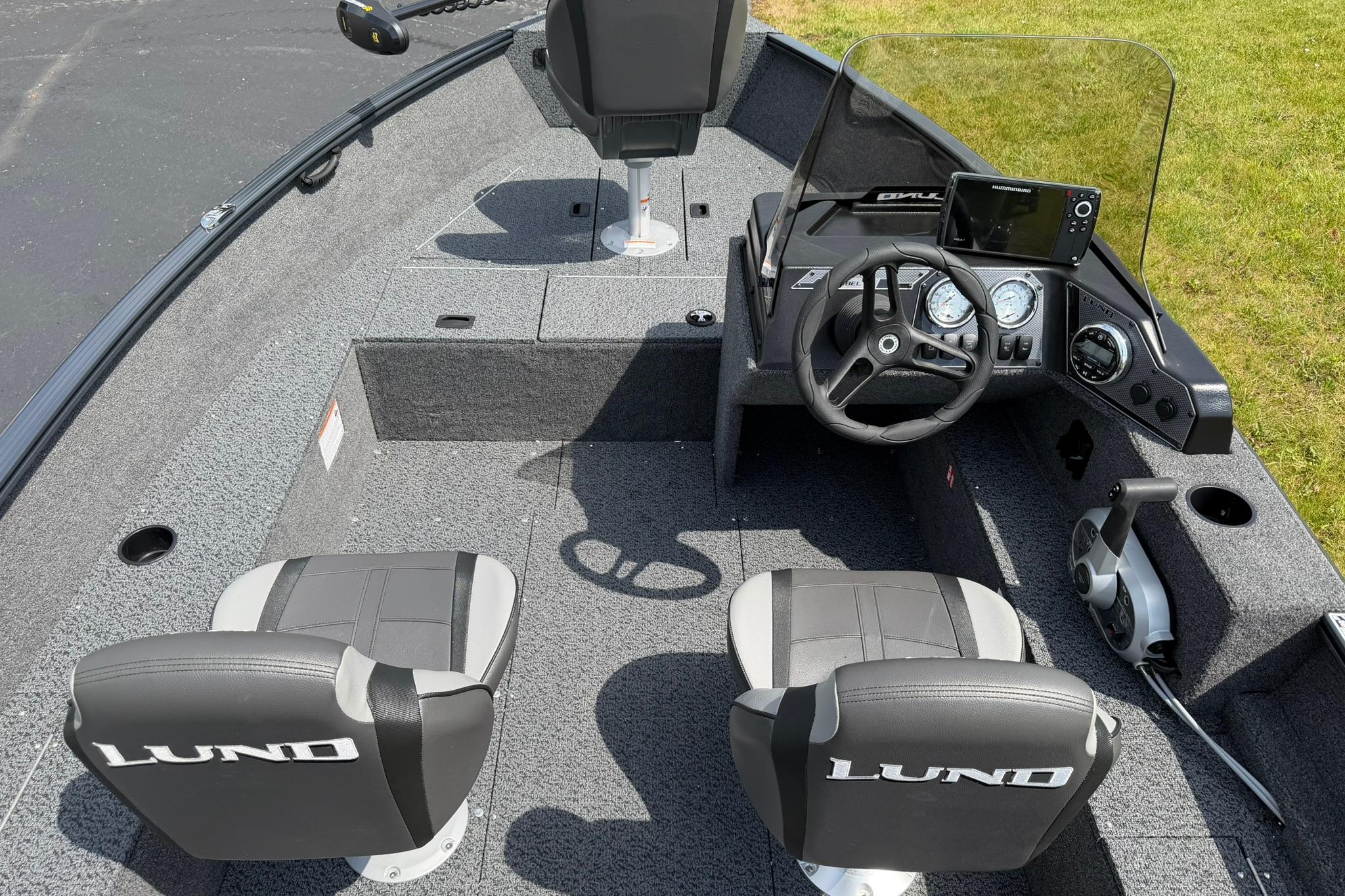 2027 Lund 1650 Rebel XL SS boat interior with steering console and seating.