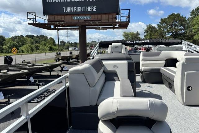 2026 Sun Tracker Fishin' Barge 22 DLX pontoon boat with spacious seating and modern design.
