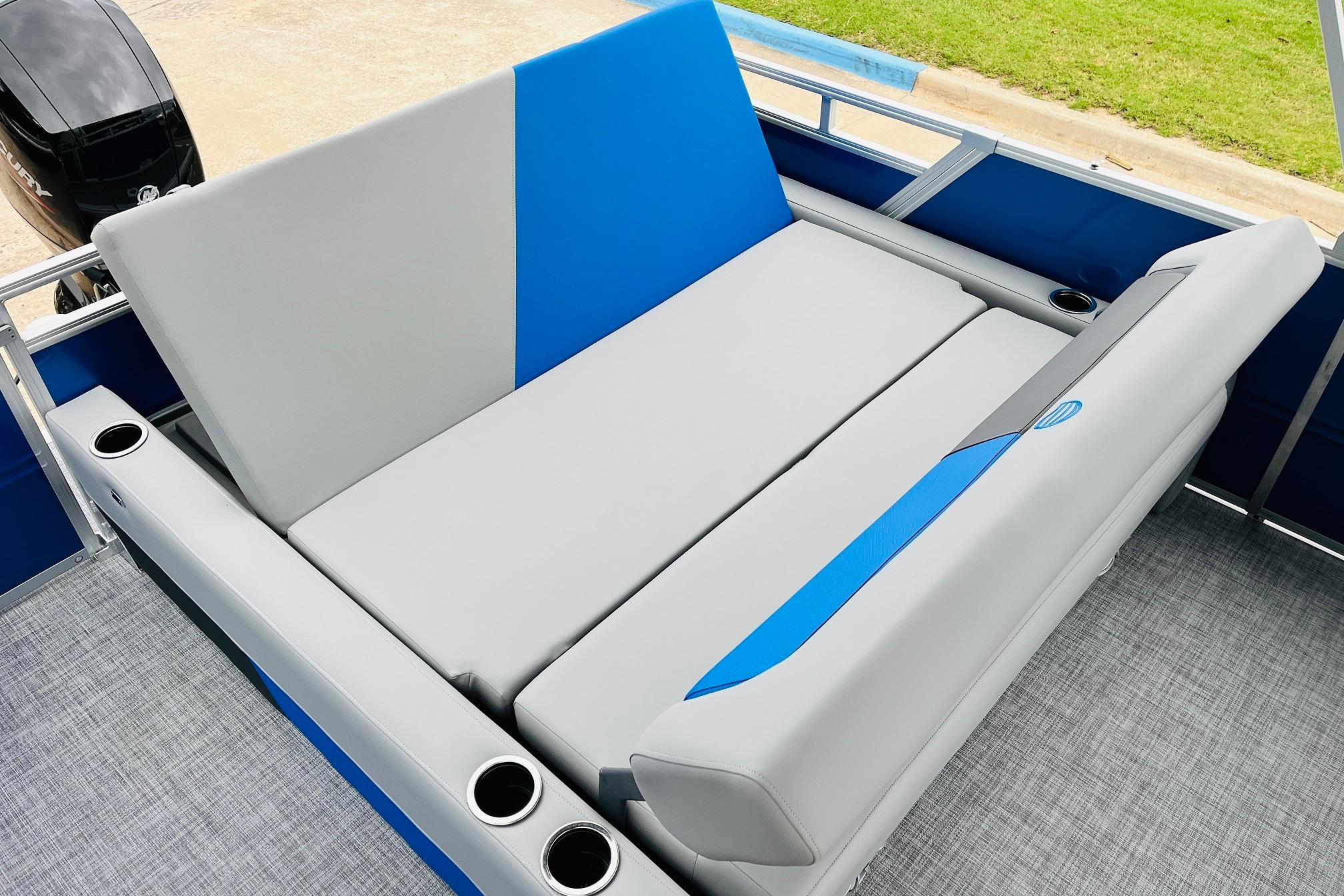 2026 Sun Tracker Party Barge 22 RF DLX with spacious seating and cup holders.
