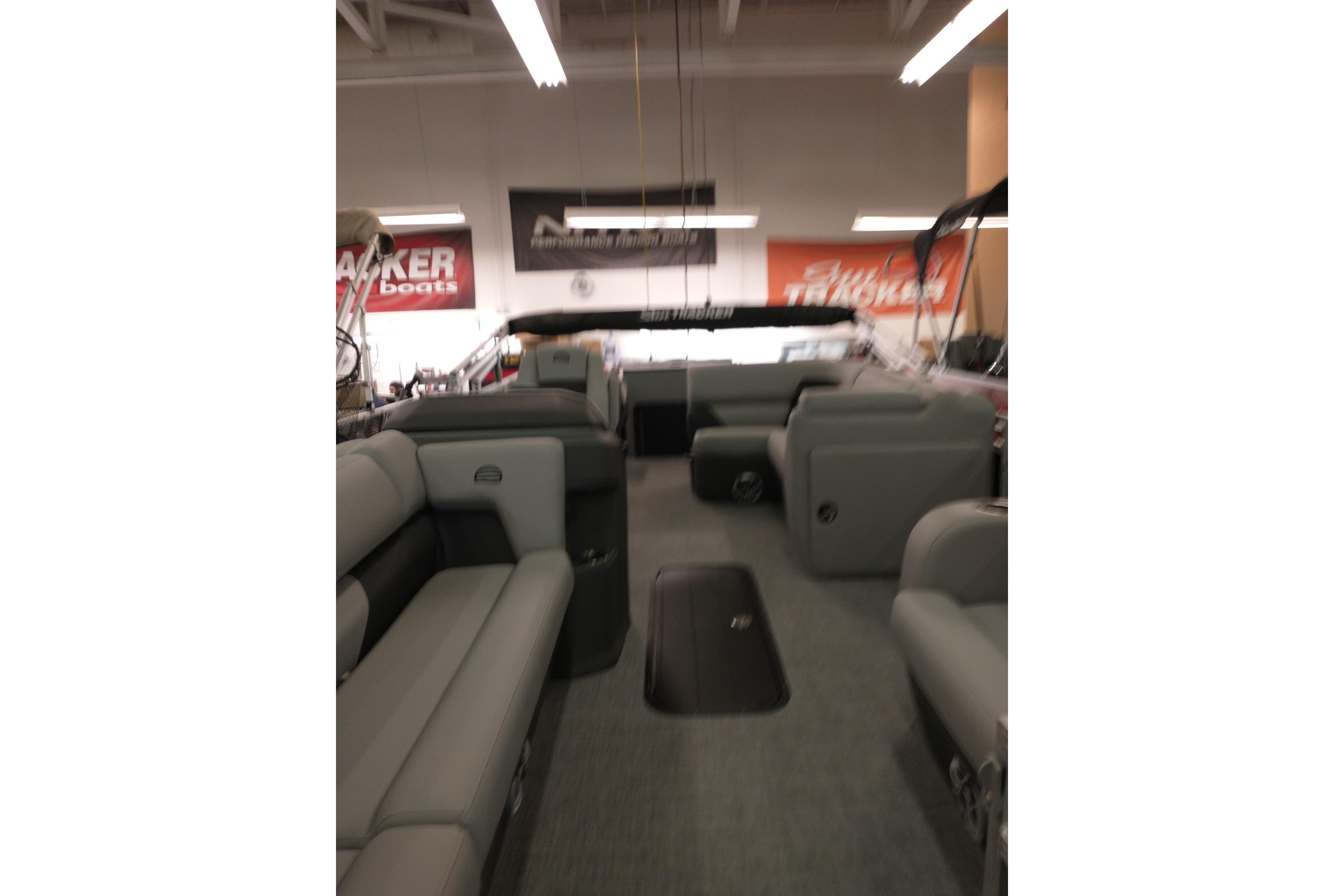 2026 Sun Tracker SportFish 22 XP3 interior with spacious seating and modern design.