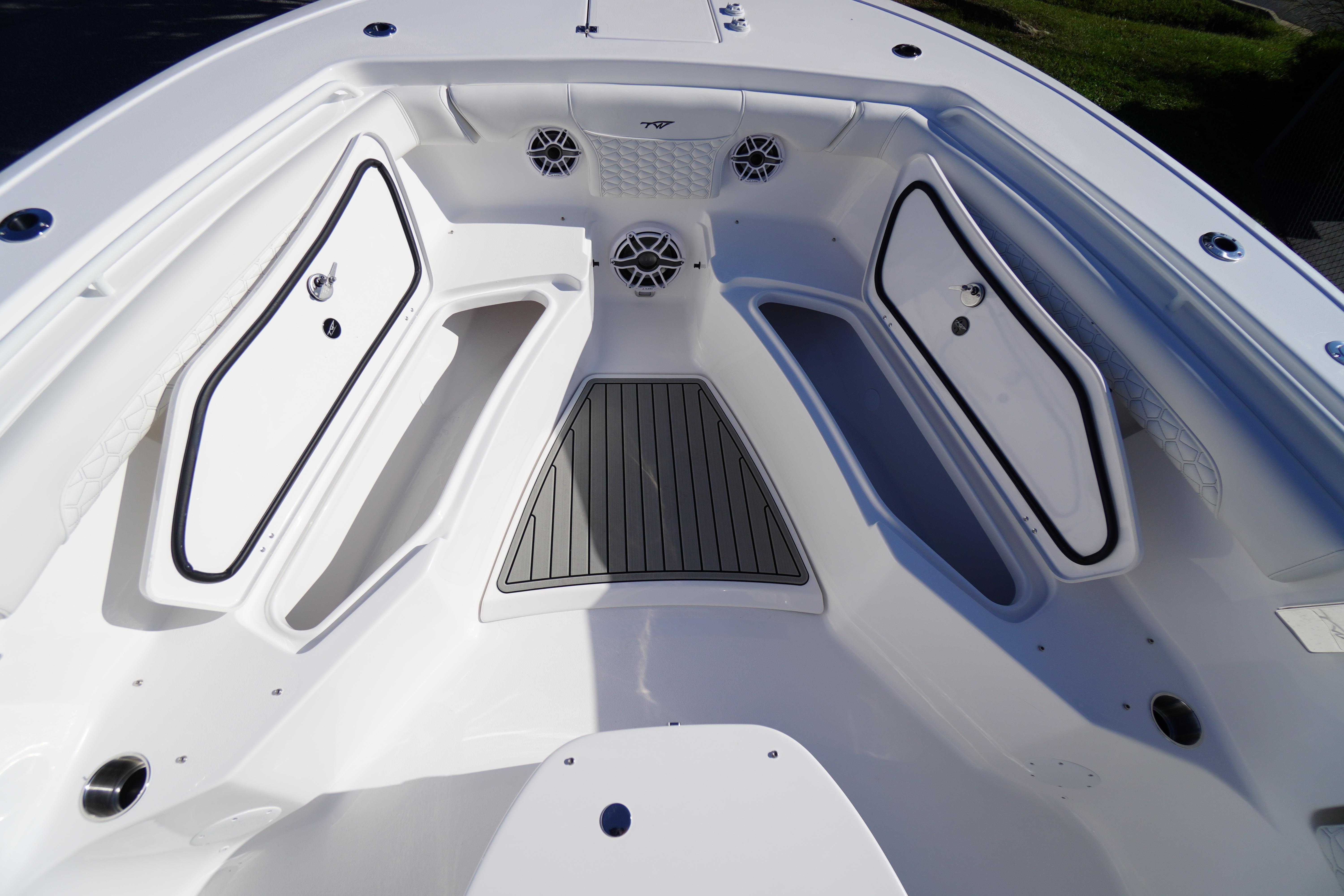 2026 Tidewater 272 LXF boat interior with storage compartments and sleek design.