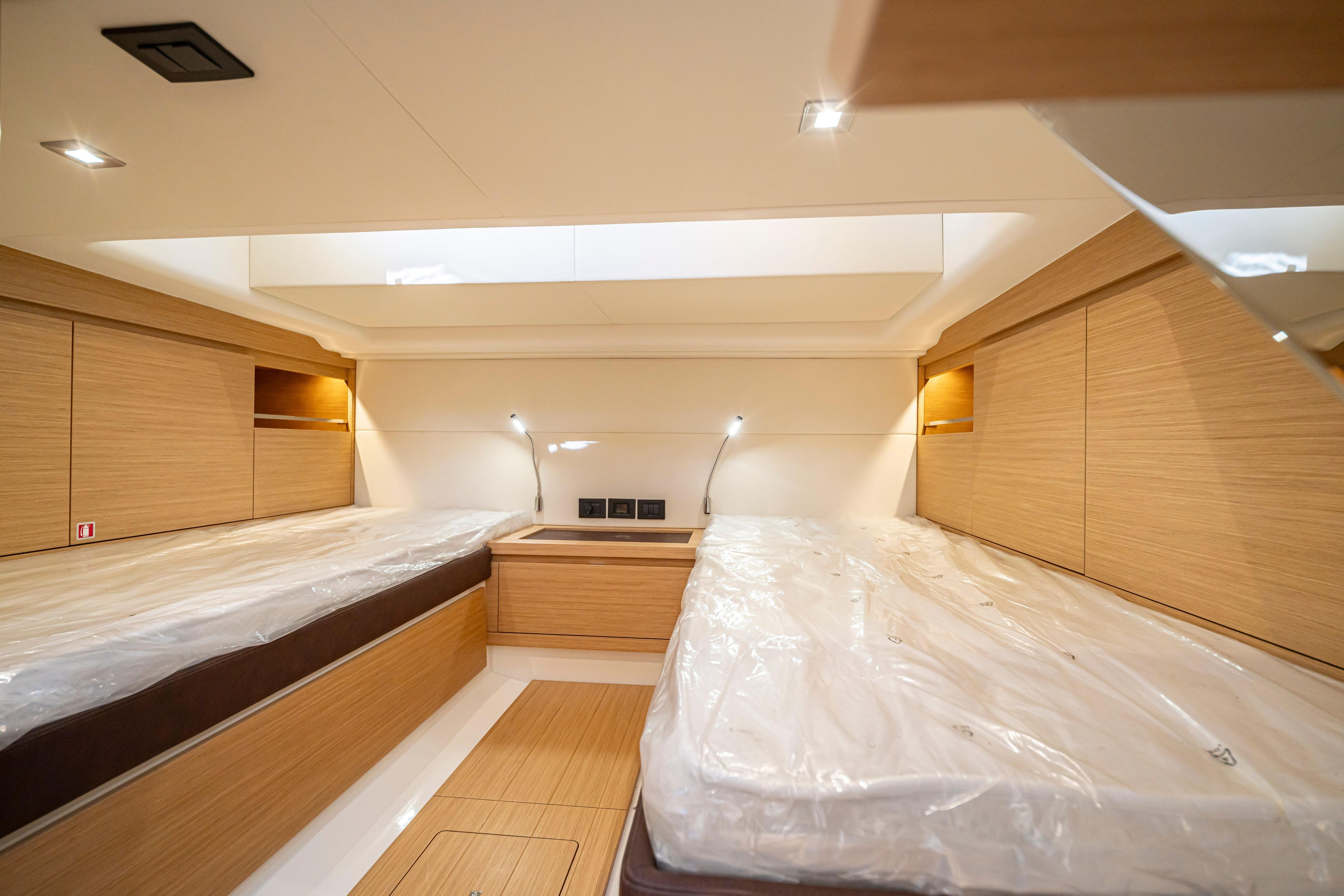 Luxurious interior cabin of 2024 Pardo Yachts P43 with modern wood finish.