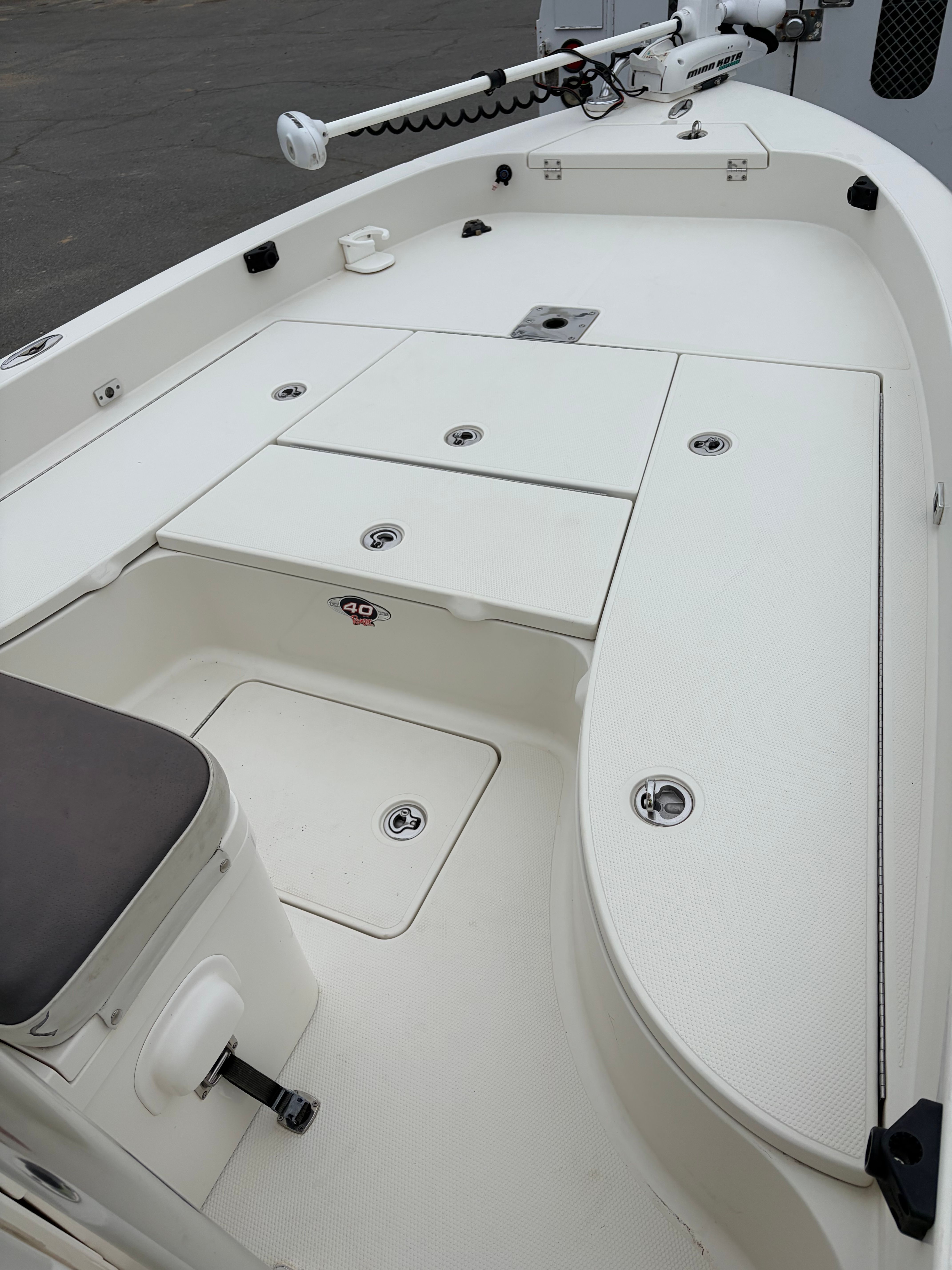 2008 Ranger 2400 Bay Ranger boat deck with storage compartments.