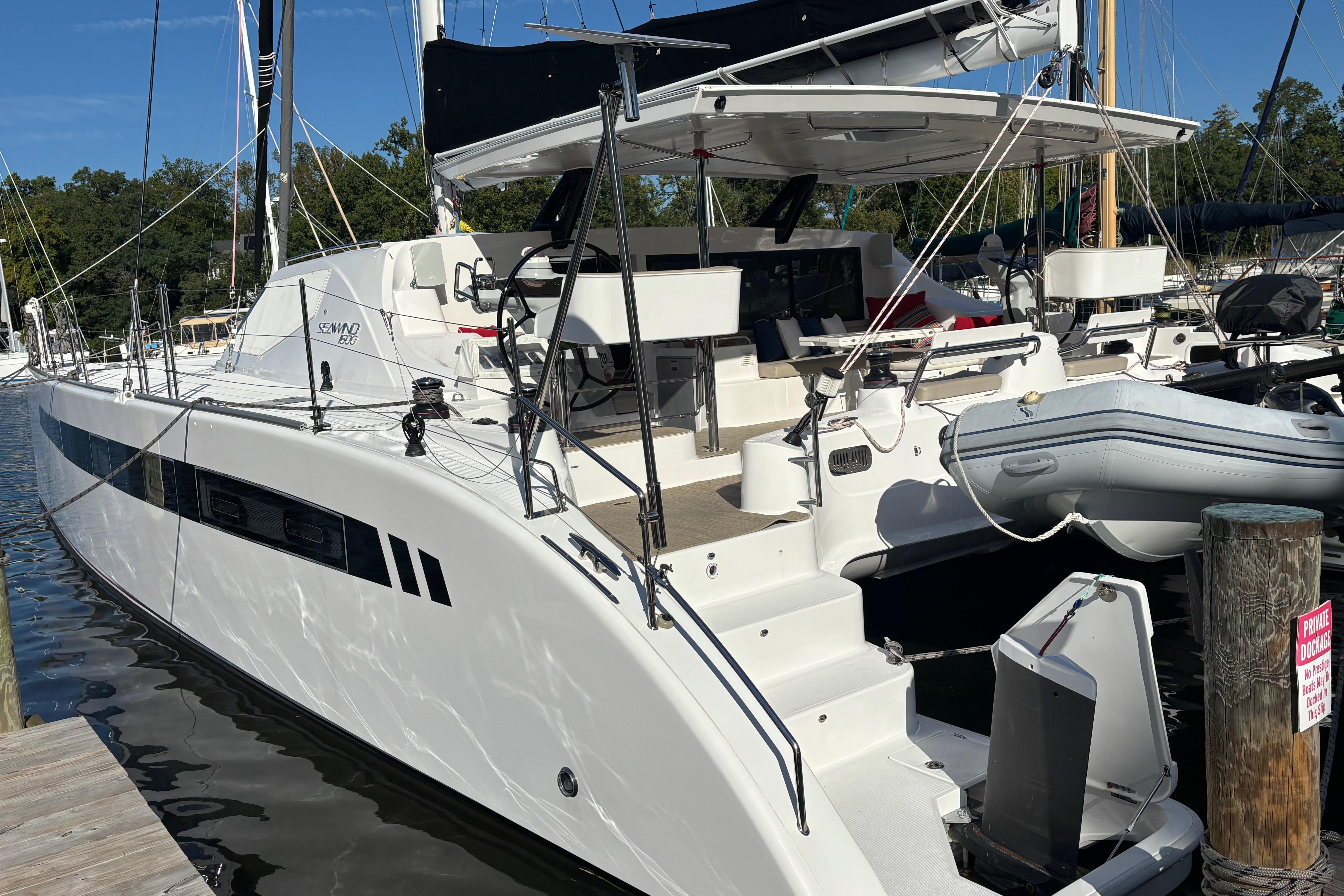 2022 Seawind 1600 catamaran docked, featuring sleek design and modern amenities.