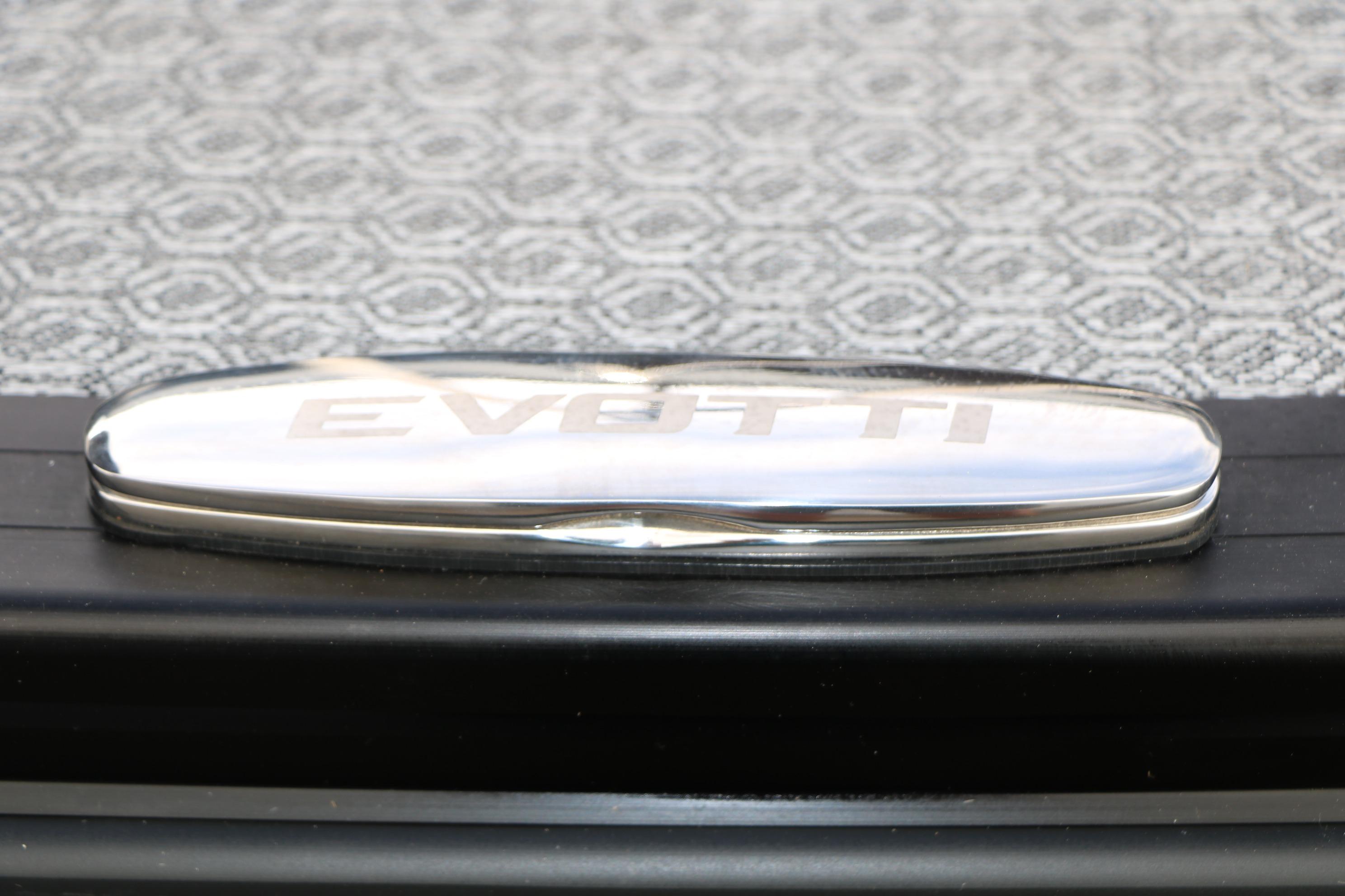 Chrome Evotti logo on patterned surface, 2026 Evotti 521QL model.