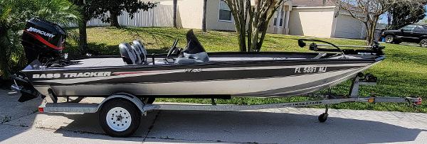 2004 Bass Tracker PRO TEAM 185 SE fishing boat on trailer.