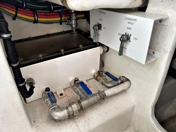 2020 Front Runner 39 Center Console boat plumbing and wiring system close-up.