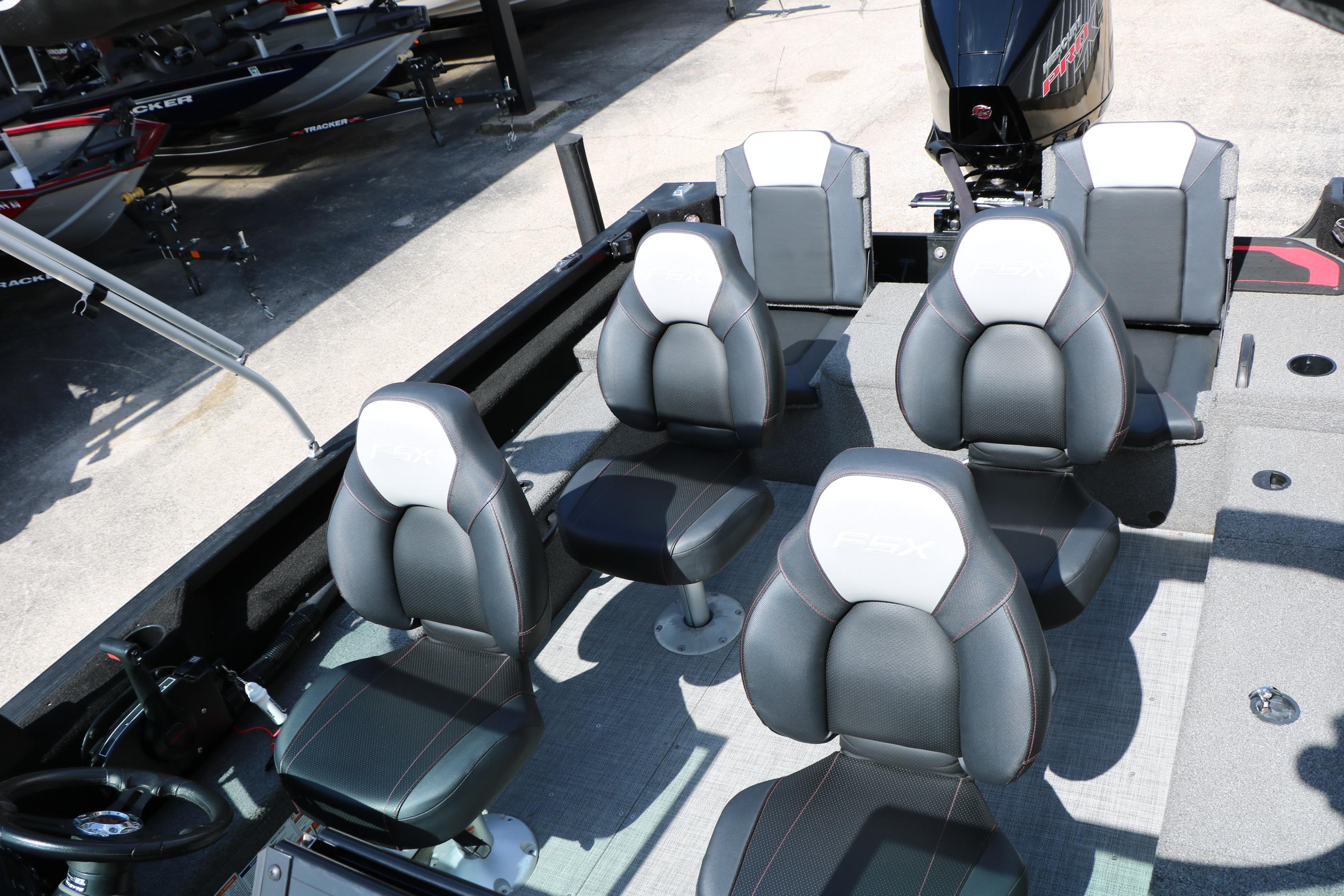 2023 Alumacraft Competitor FSX 185 boat interior with multiple cushioned seats.