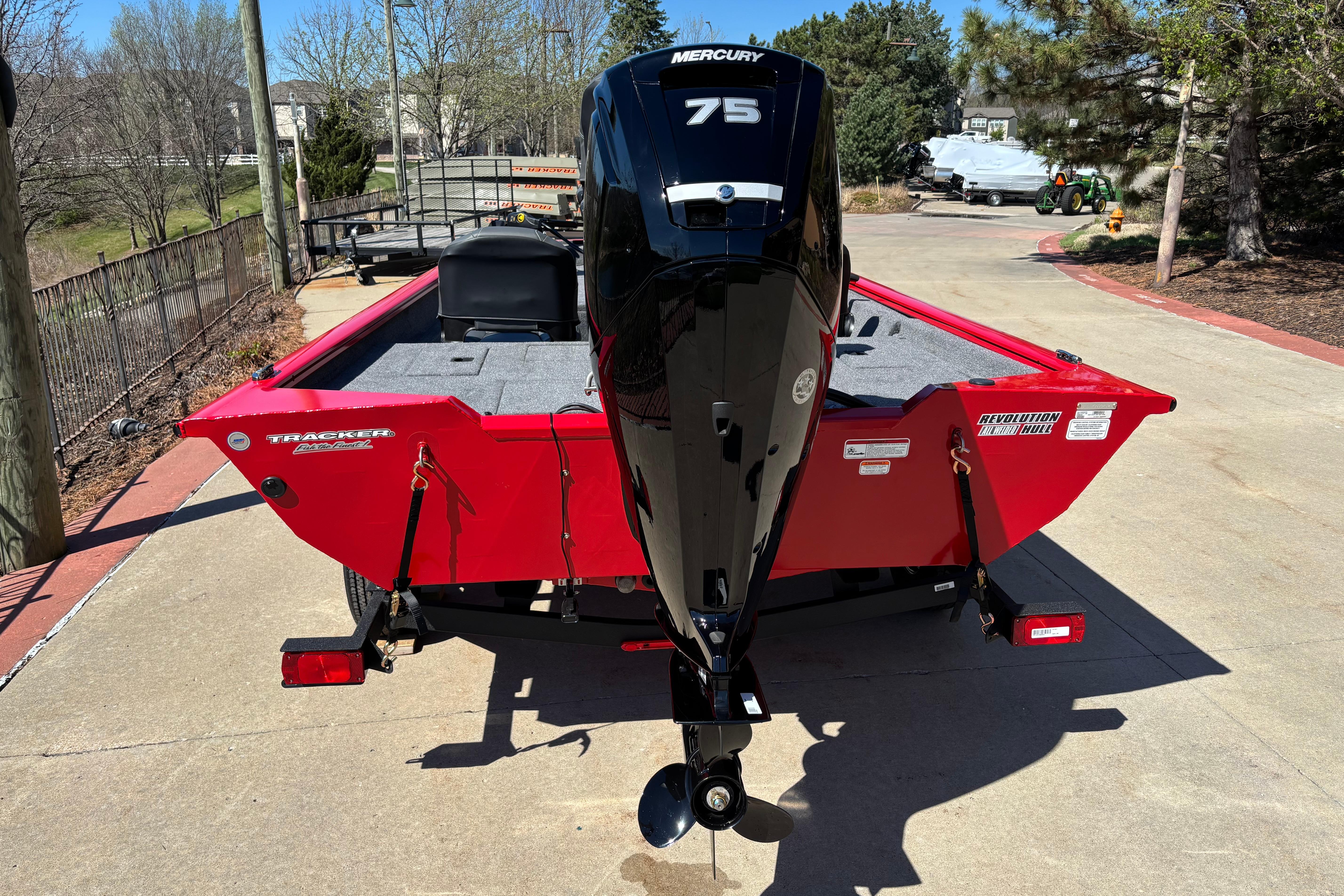 2026 Tracker Pro Team 175 Crappie Edition boat with Mercury 75 engine, parked outdoors.