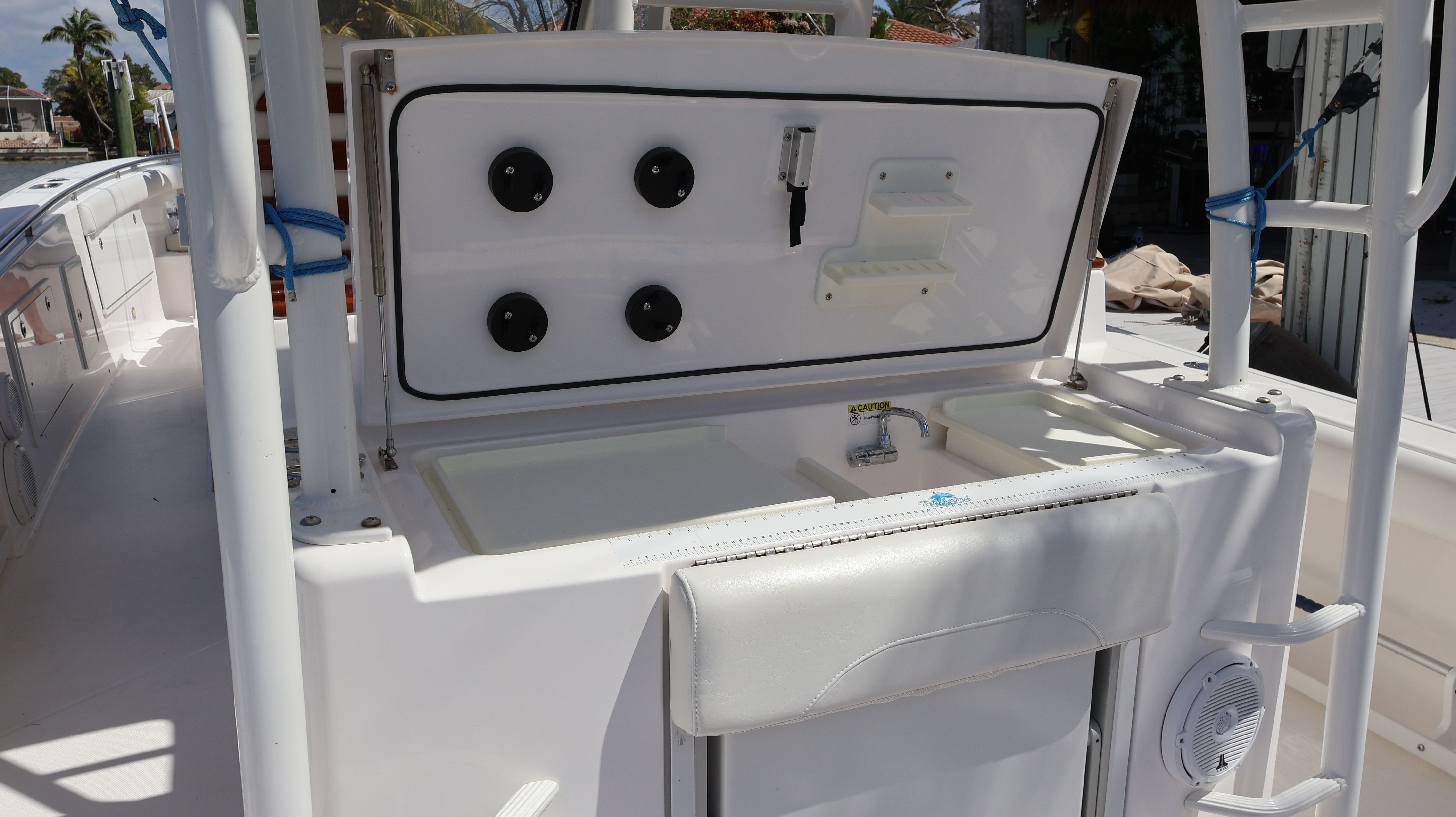 2019 Everglades 435 Center Console with integrated sink and storage.