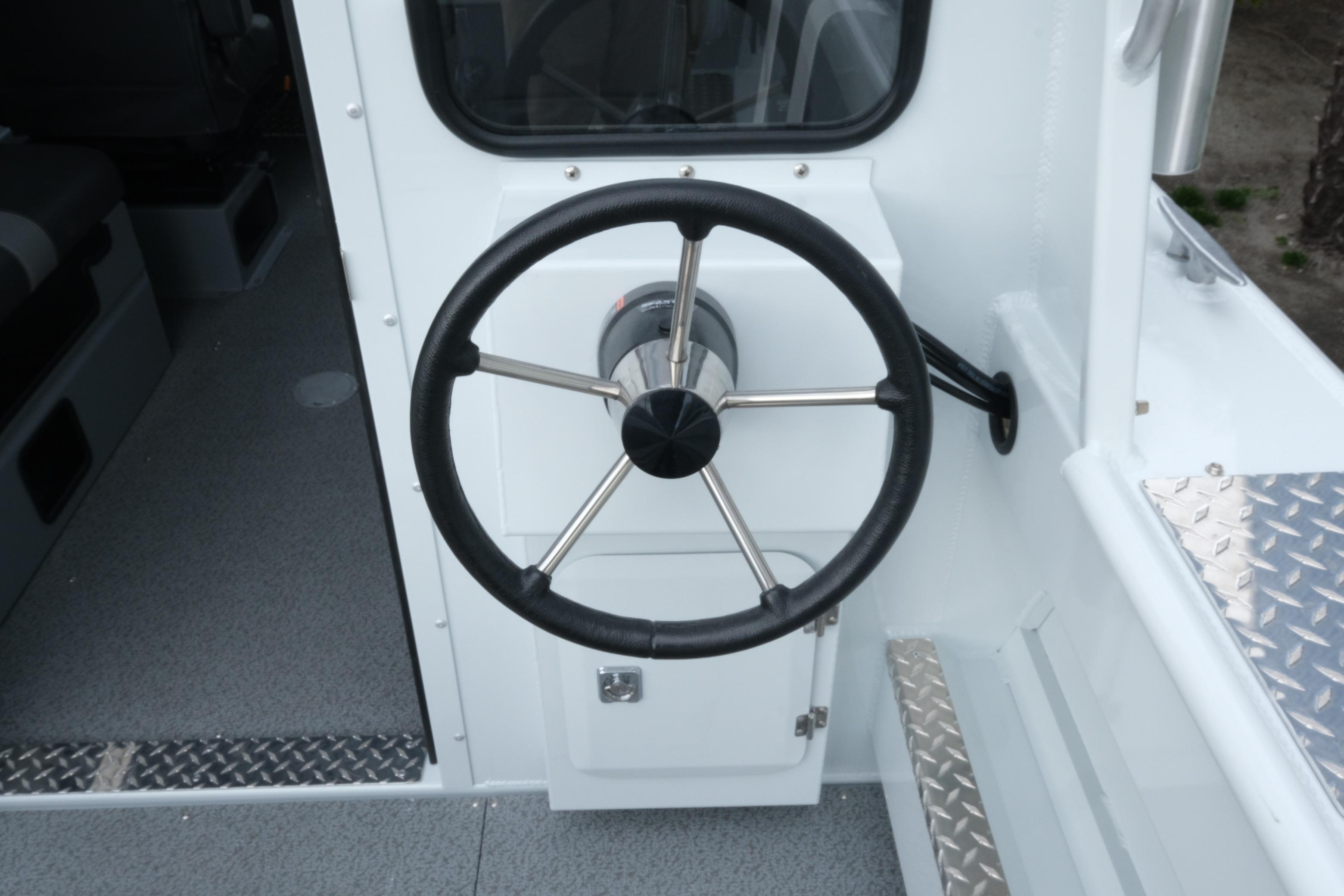 Steering wheel of 2026 Hewescraft 210 Sea Runner ET Hardtop boat interior.