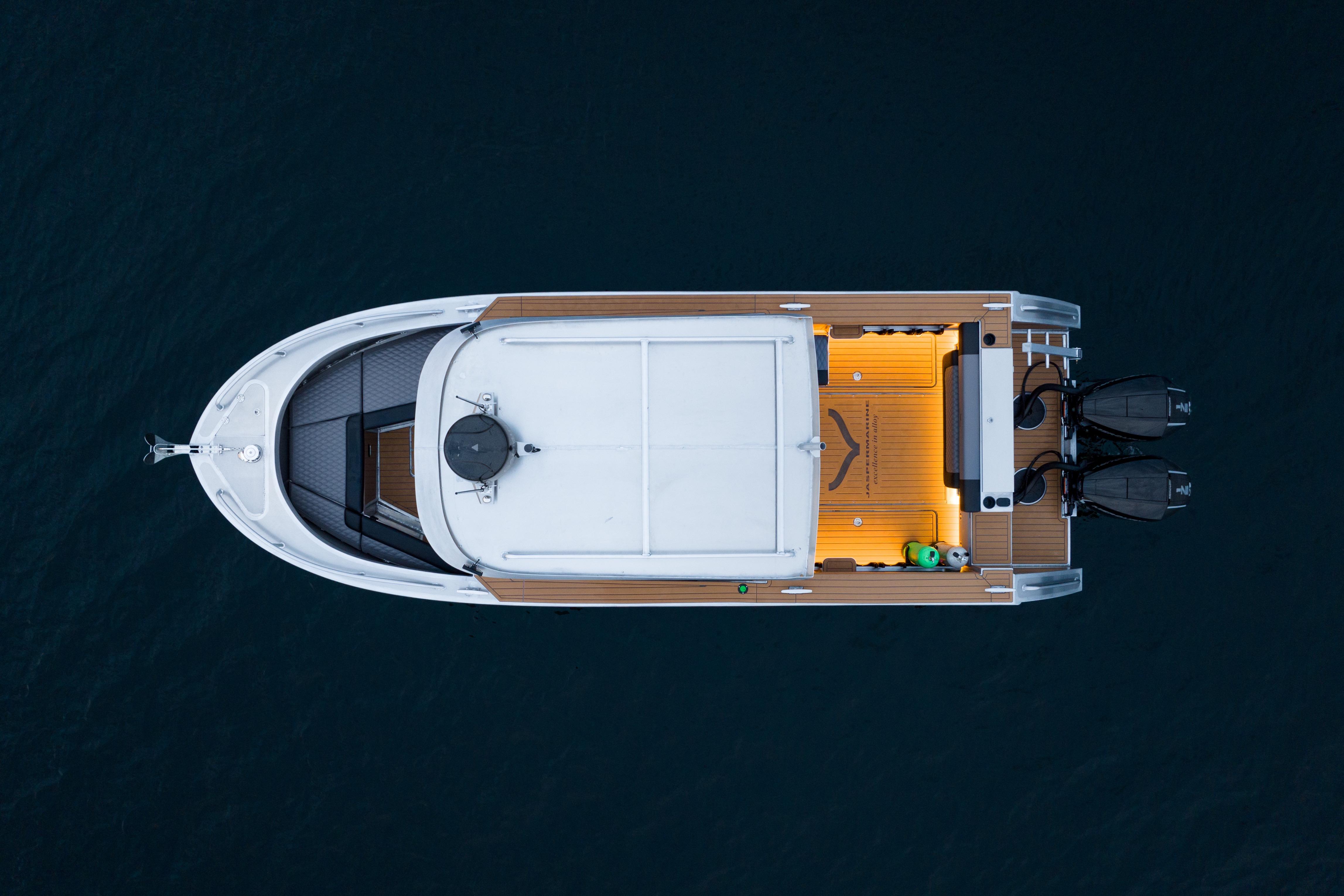 Aerial view of 2026 Jasper Marine Defender 22 boat on water.