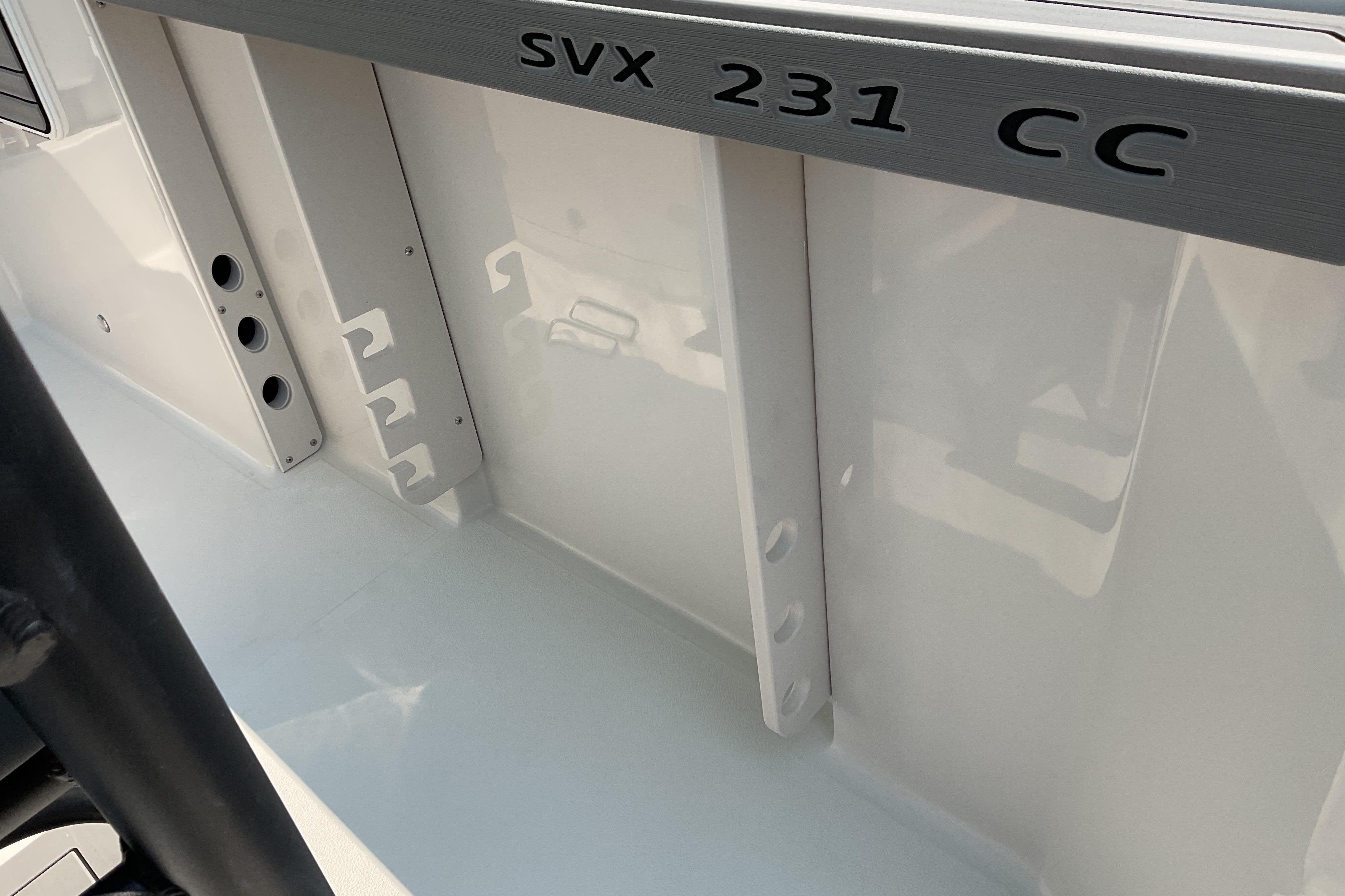 2026 Starcraft SVX 231 OB CC boat interior detail with storage compartments.