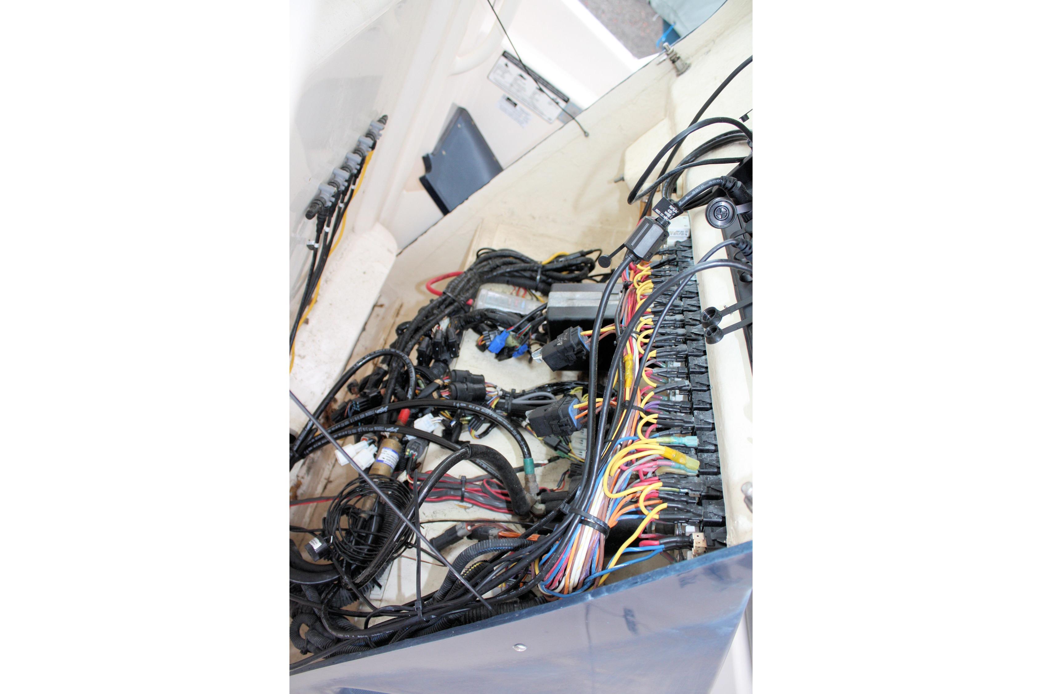 Electrical wiring system inside a 2013 Pursuit ST 310 Sport boat.