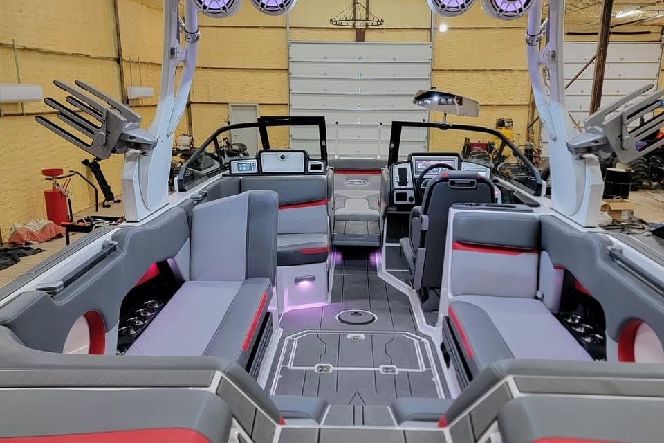 2023 Supra SE 550 boat interior with modern seating and advanced controls.