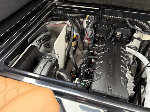 Engine compartment of 2025 Yamaha Boats 255XD, showcasing advanced marine technology.