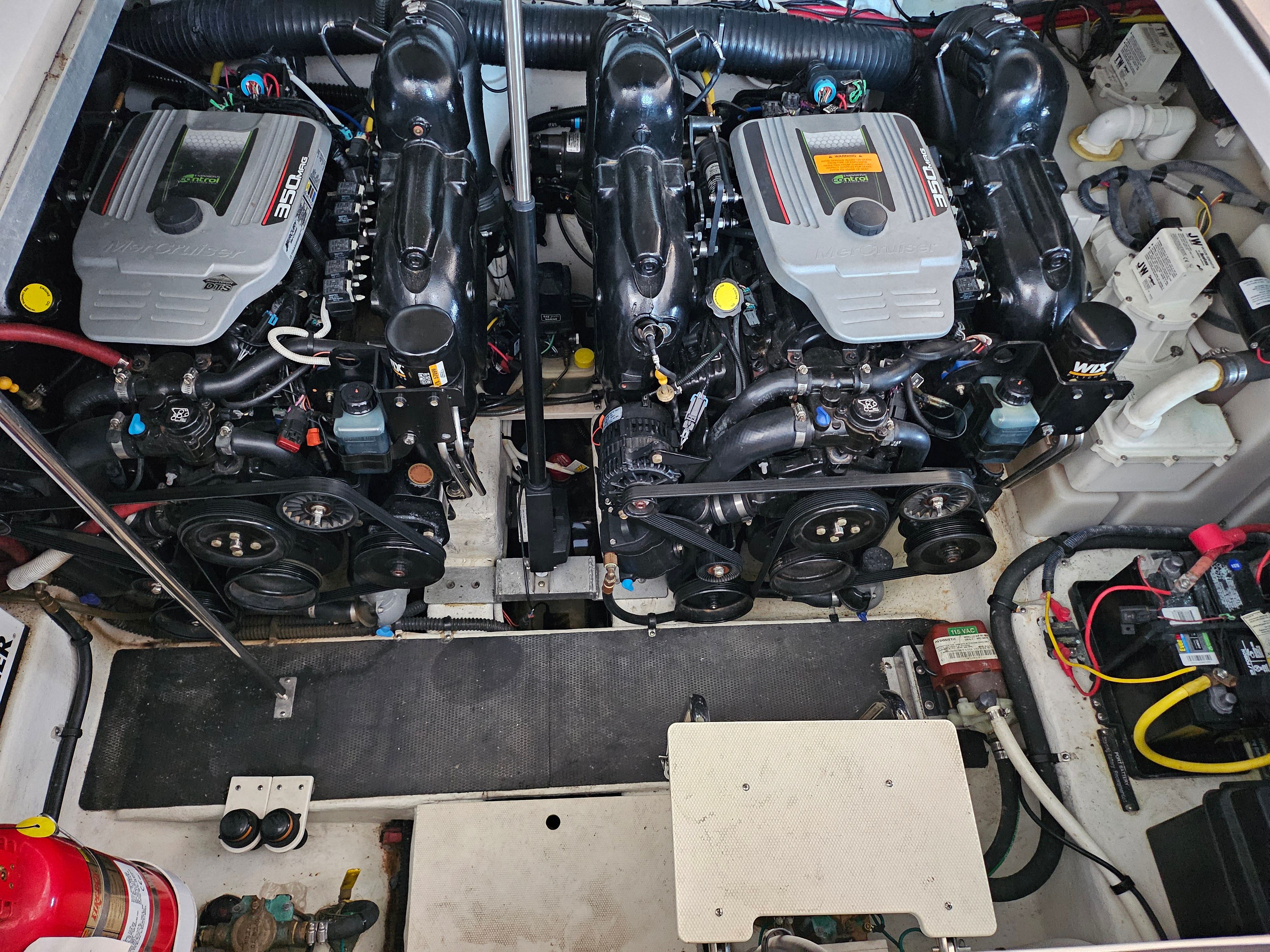 Engine room of 2014 Chaparral 330 Signature with dual engines.