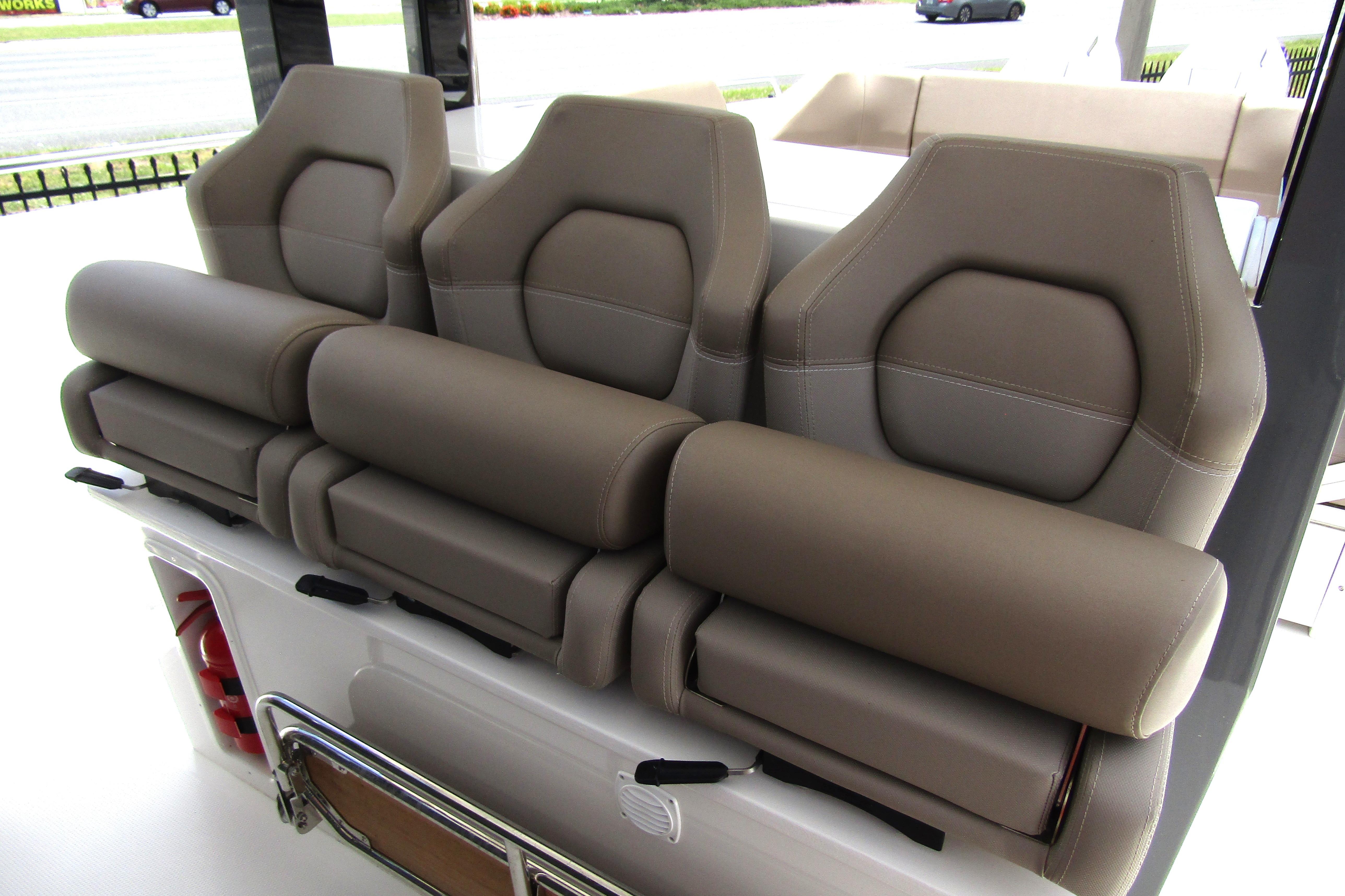 Three luxurious seats on a 2025 Nimbus Tender 11 boat, featuring ergonomic design.