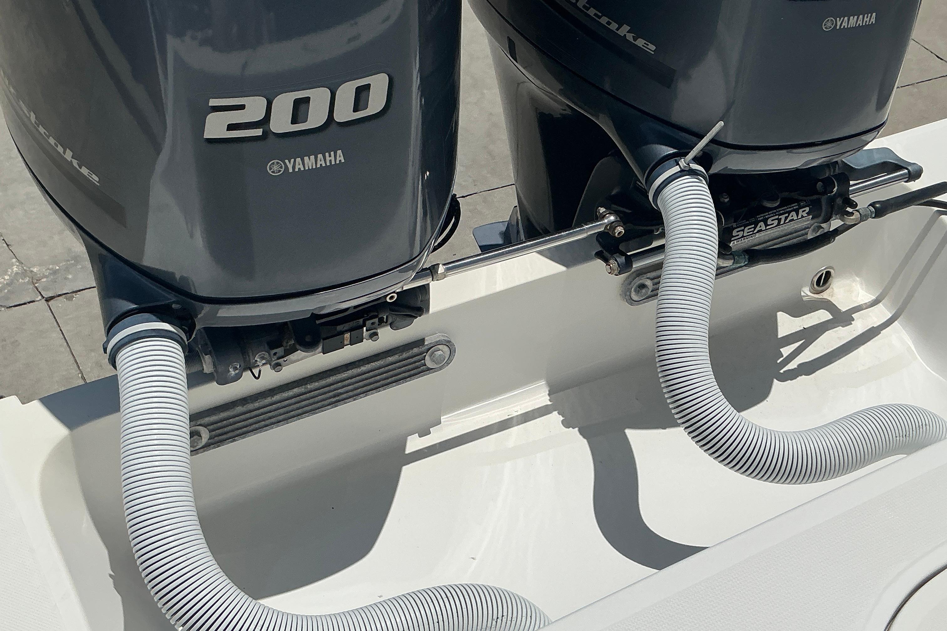 Twin Yamaha 200 outboard engines on a 2015 Jupiter 26 FS boat.