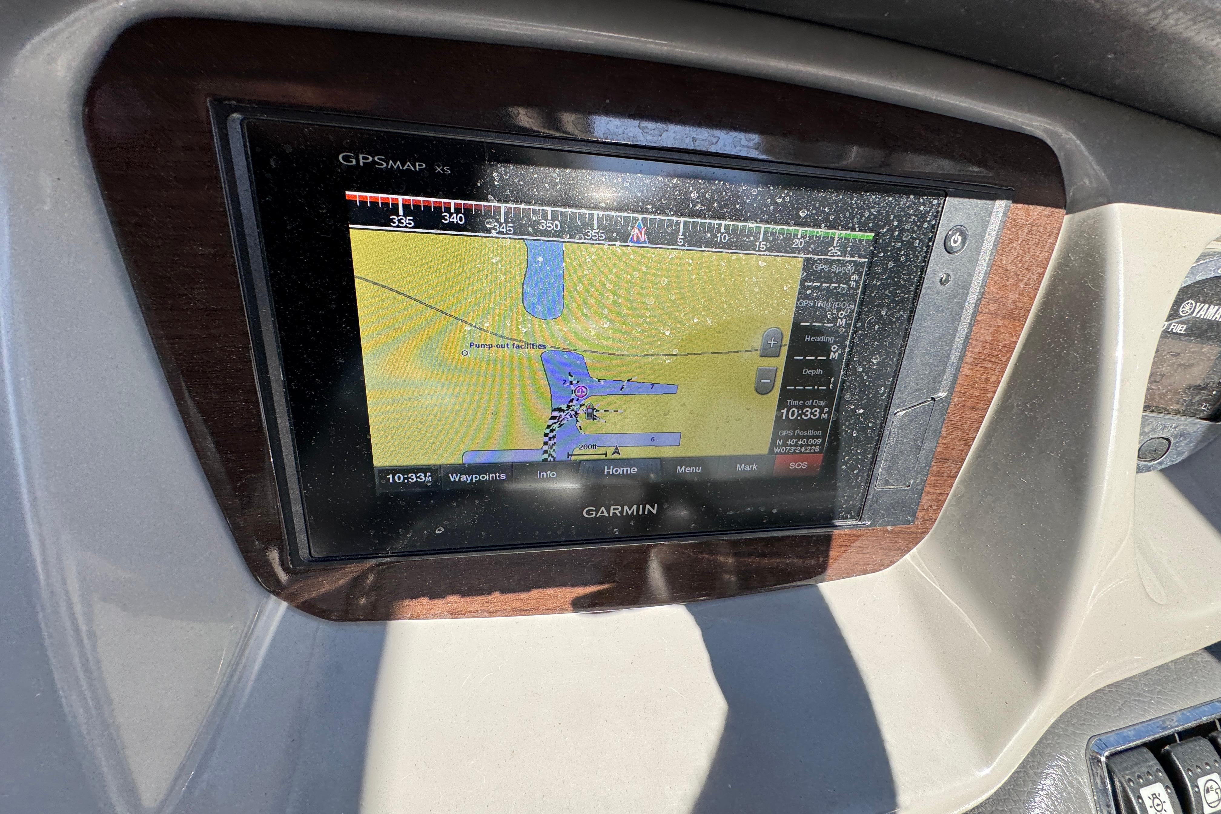 Garmin GPS display on 2018 Chaparral 250 Suncoast boat dashboard.