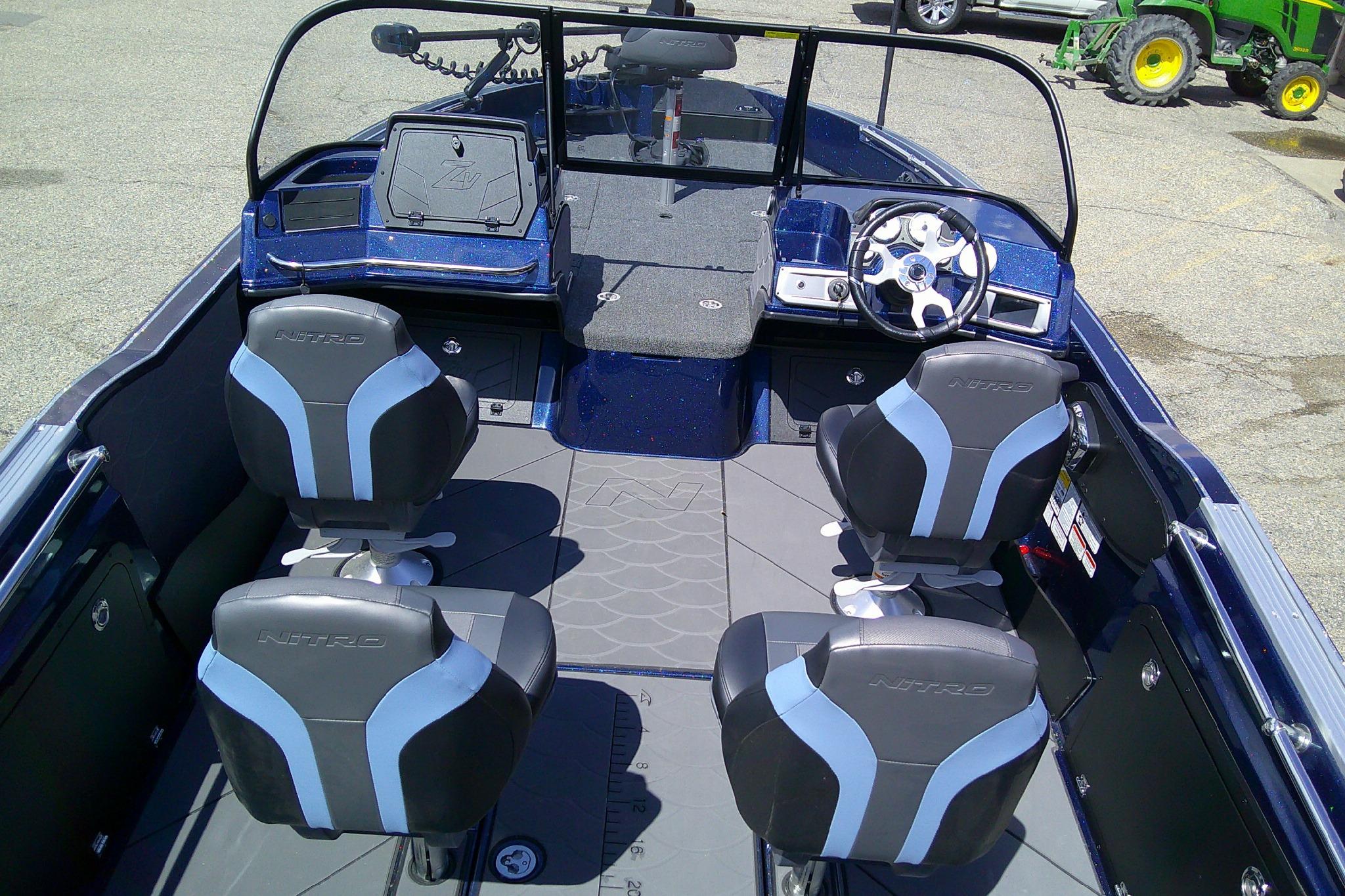 2025 Nitro ZV20 Sport boat interior with four seats and steering wheel.