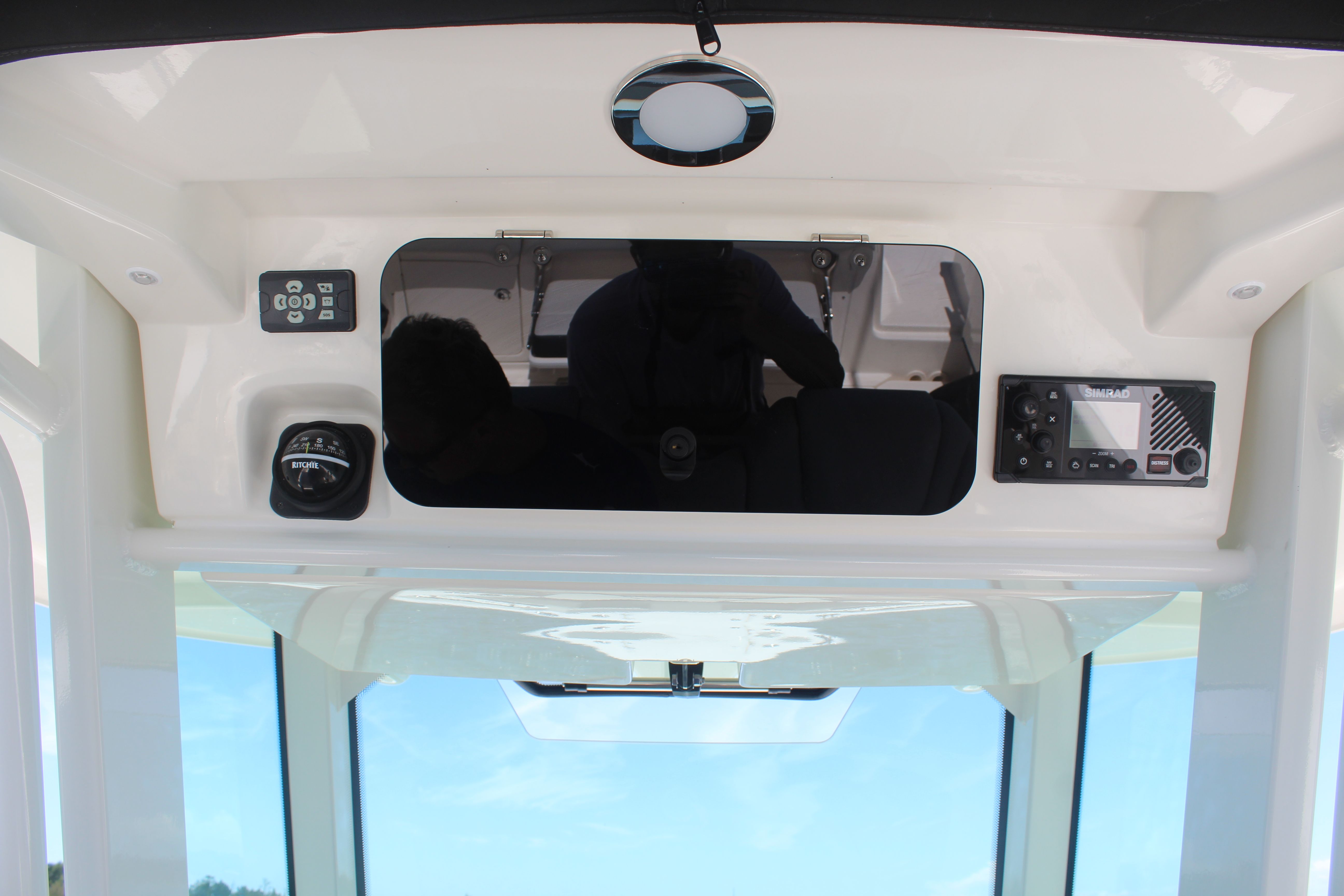 Interior view of 2026 Boston Whaler 330 Outrage cockpit.
