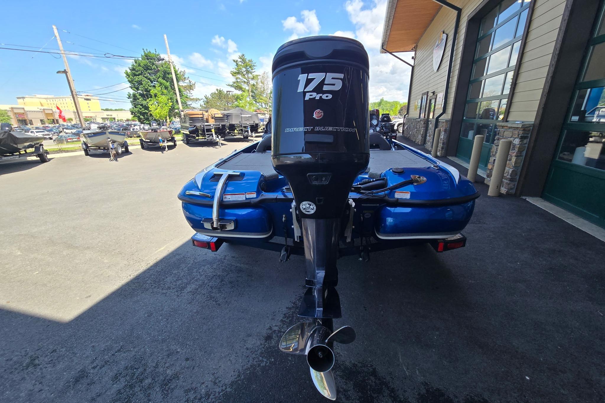 2014 Nitro Z-7 boat with 175 Pro engine, parked outdoors near a building.