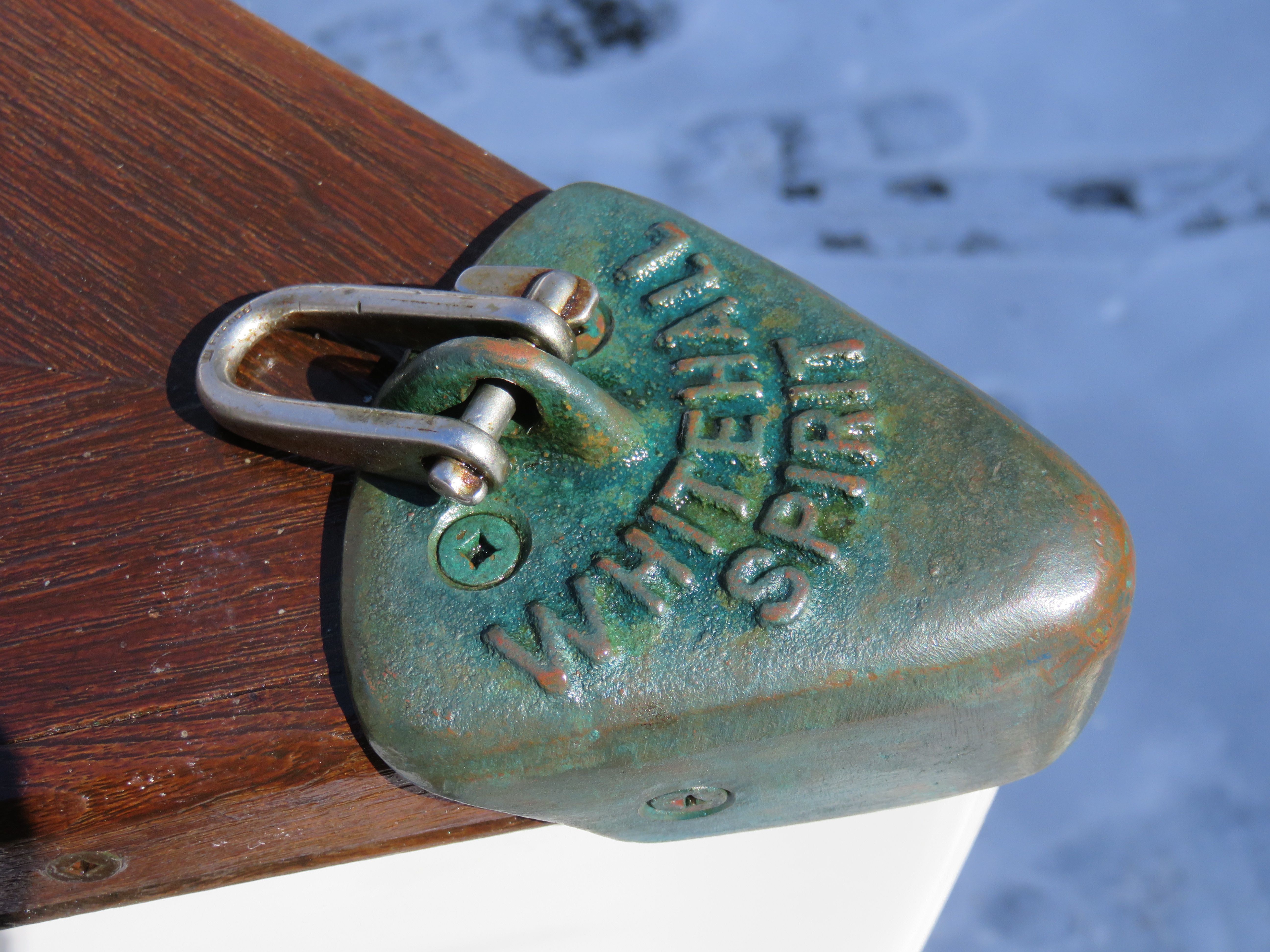Close-up of a boat detail with "Whitehall Spirit" engraved on metal.