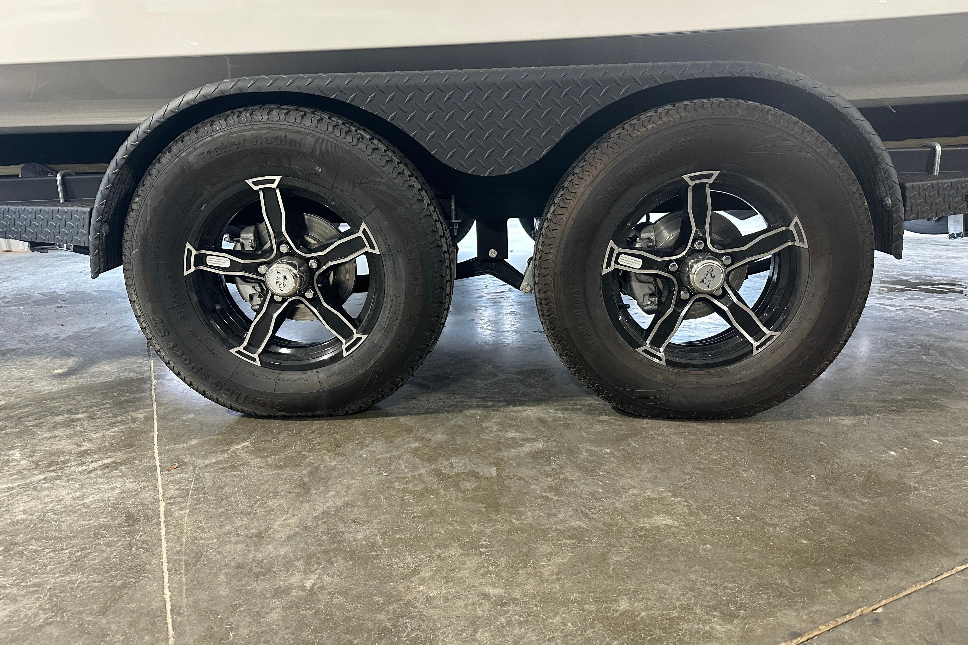 Dual wheels of 2026 Chaparral SSX 6 on concrete floor.