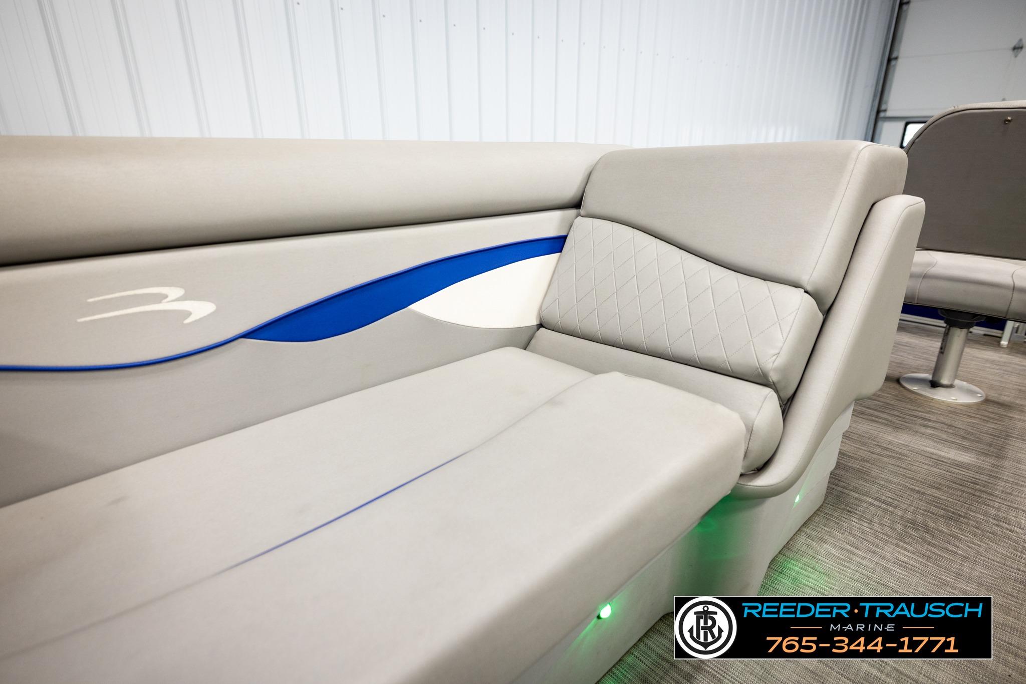 2021 Bennington 20 SV boat interior with gray seating and blue accents.