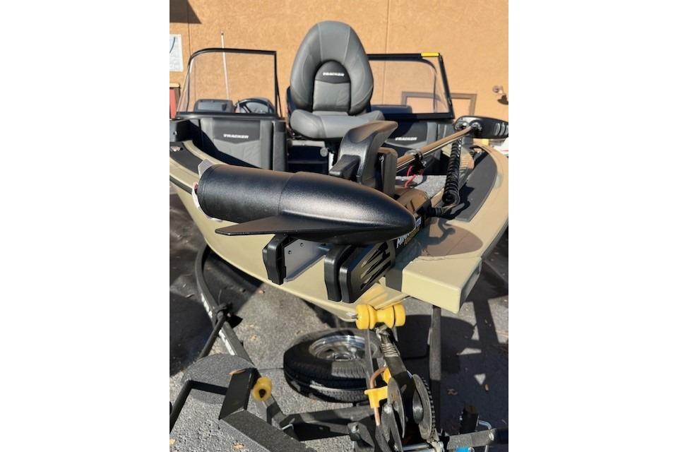 2026 Tracker Targa V-18 Combo boat with motor and seating, displayed outdoors.