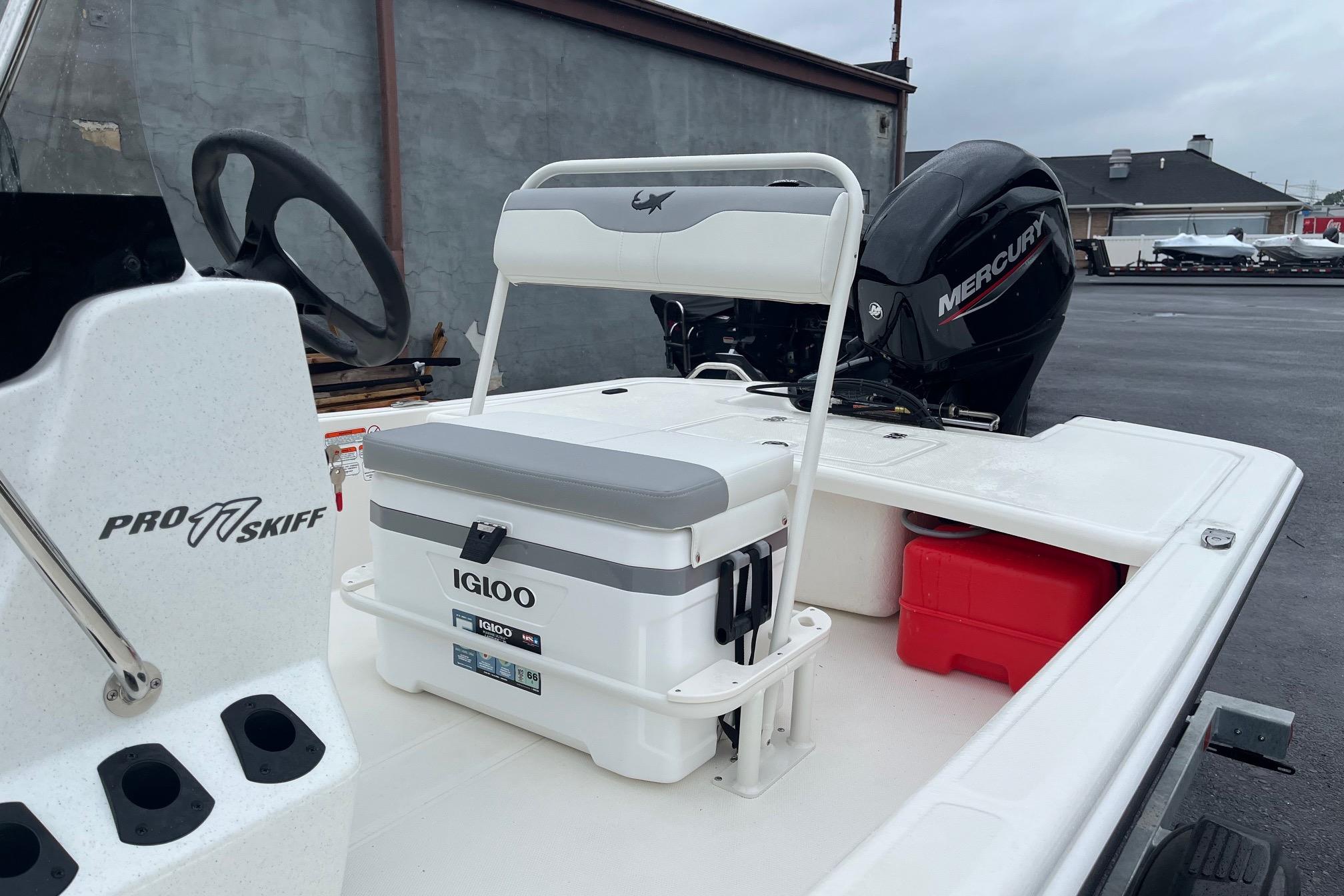 2026 Mako Pro Skiff 17 CC boat with Igloo cooler and Mercury engine.