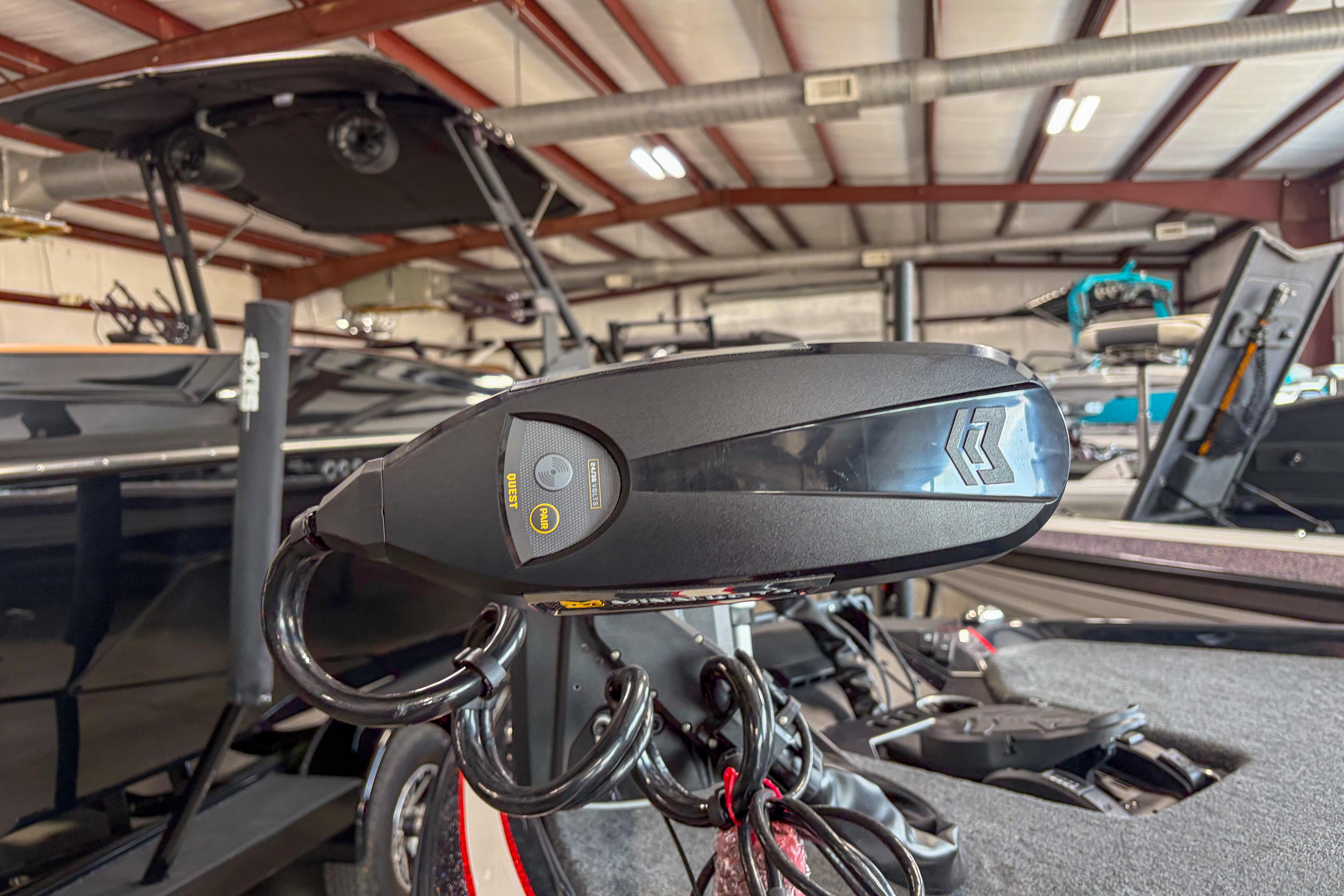2026 Skeeter FXR20 FLEX boat detail in a showroom with advanced equipment.