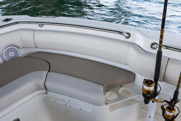 Manufacturer Provided Image: 2024 Boston Whaler 230 Outrage boat seating area with fishing rods.