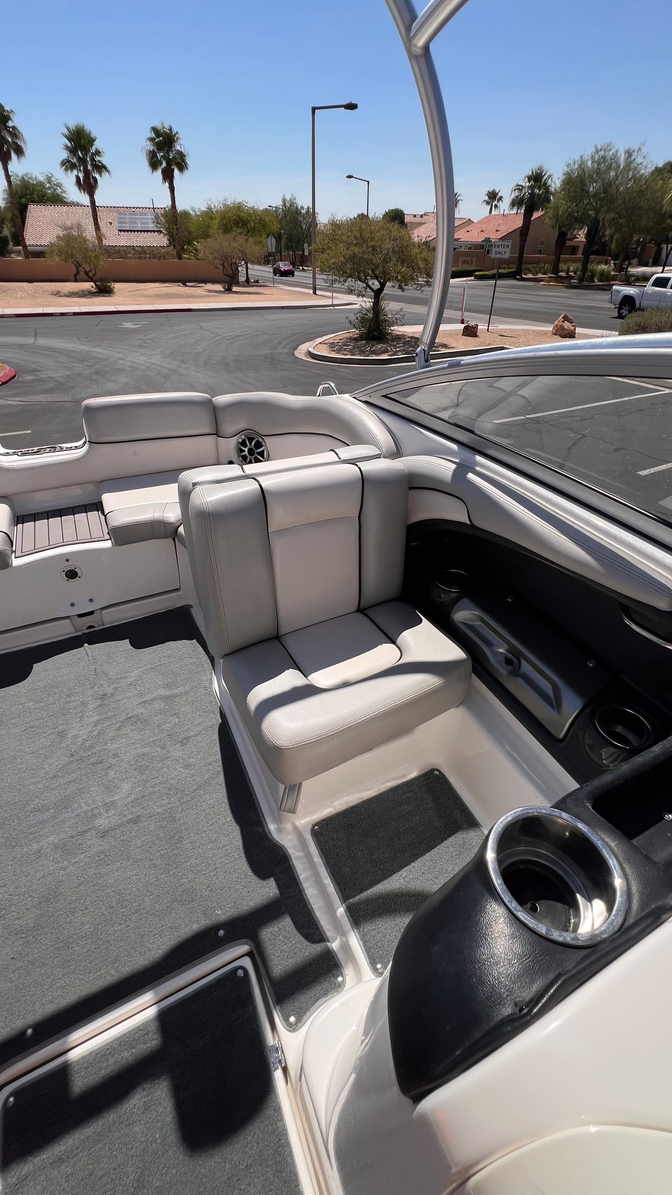 Interior of a 2011 Yamaha AR240 HO boat with seating.