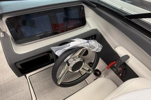 2027 Regal LS4 boat dashboard with steering wheel and modern controls.