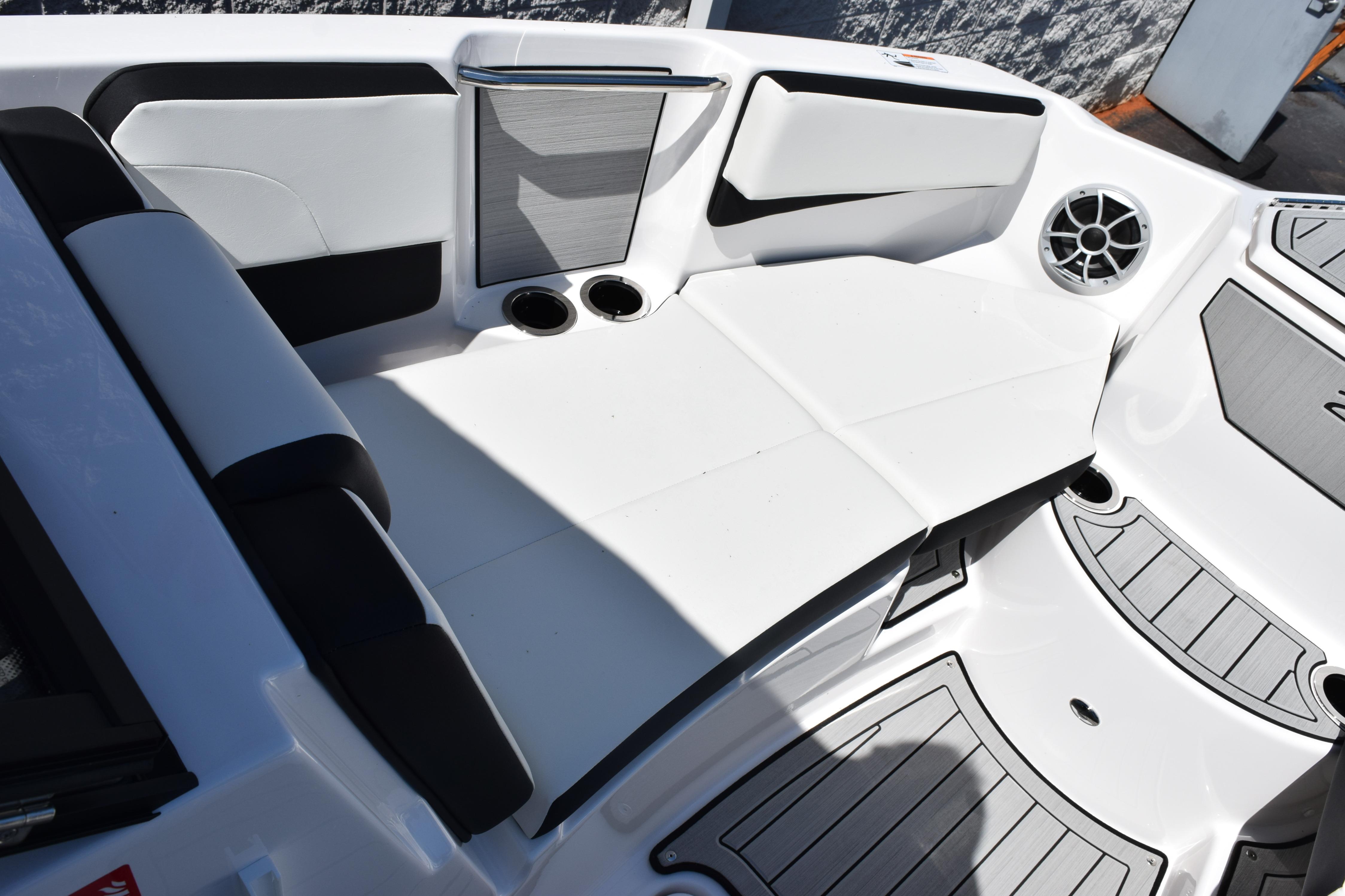 2026 Yamaha Boats 222SE interior with sleek seating and modern design elements.