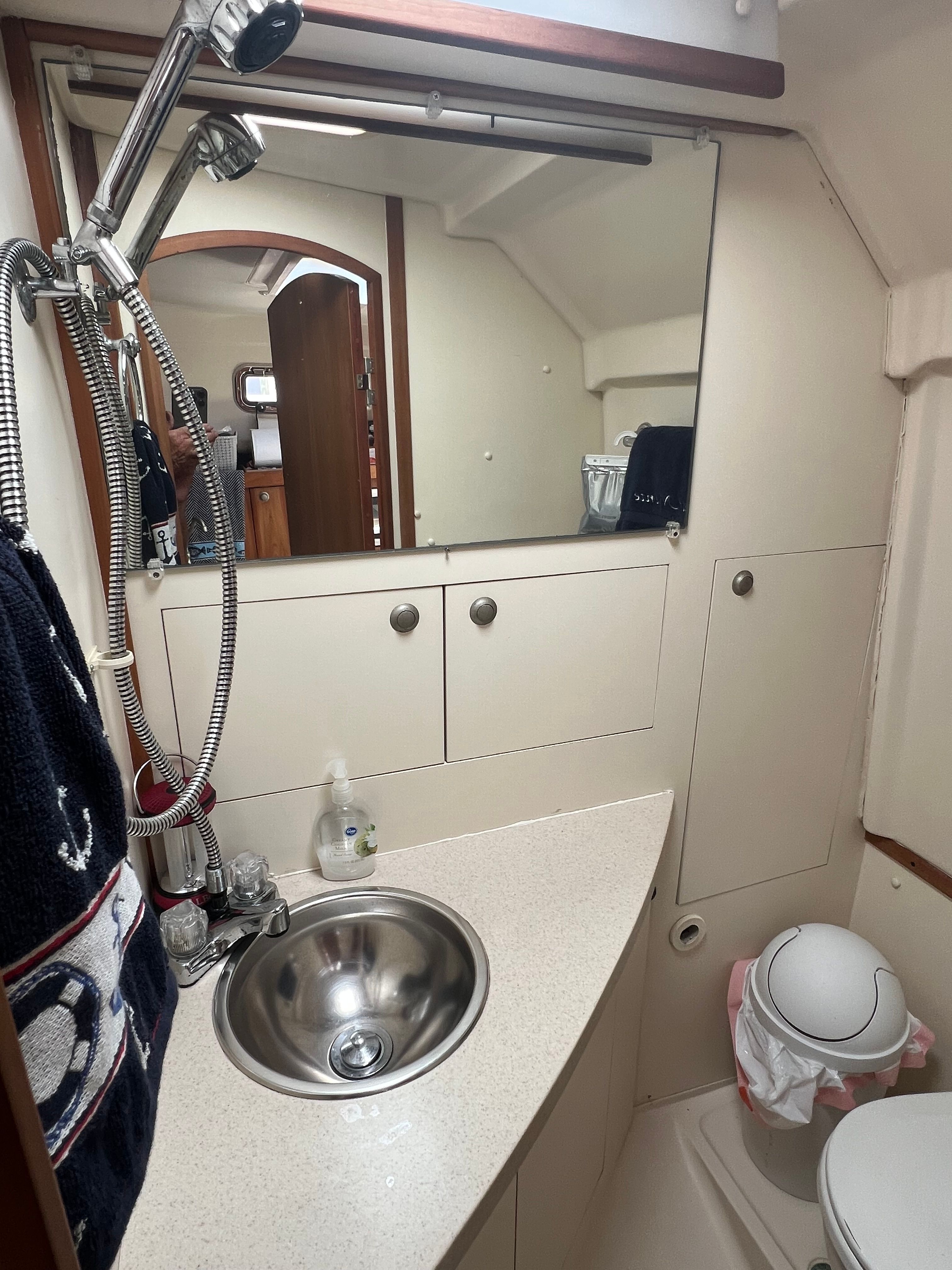 Bathroom on a 2003 Mainship Pilot 30-II boat.