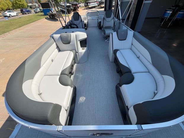 Interior of 2025 Tahoe LTZ QL pontoon boat with luxurious seating.