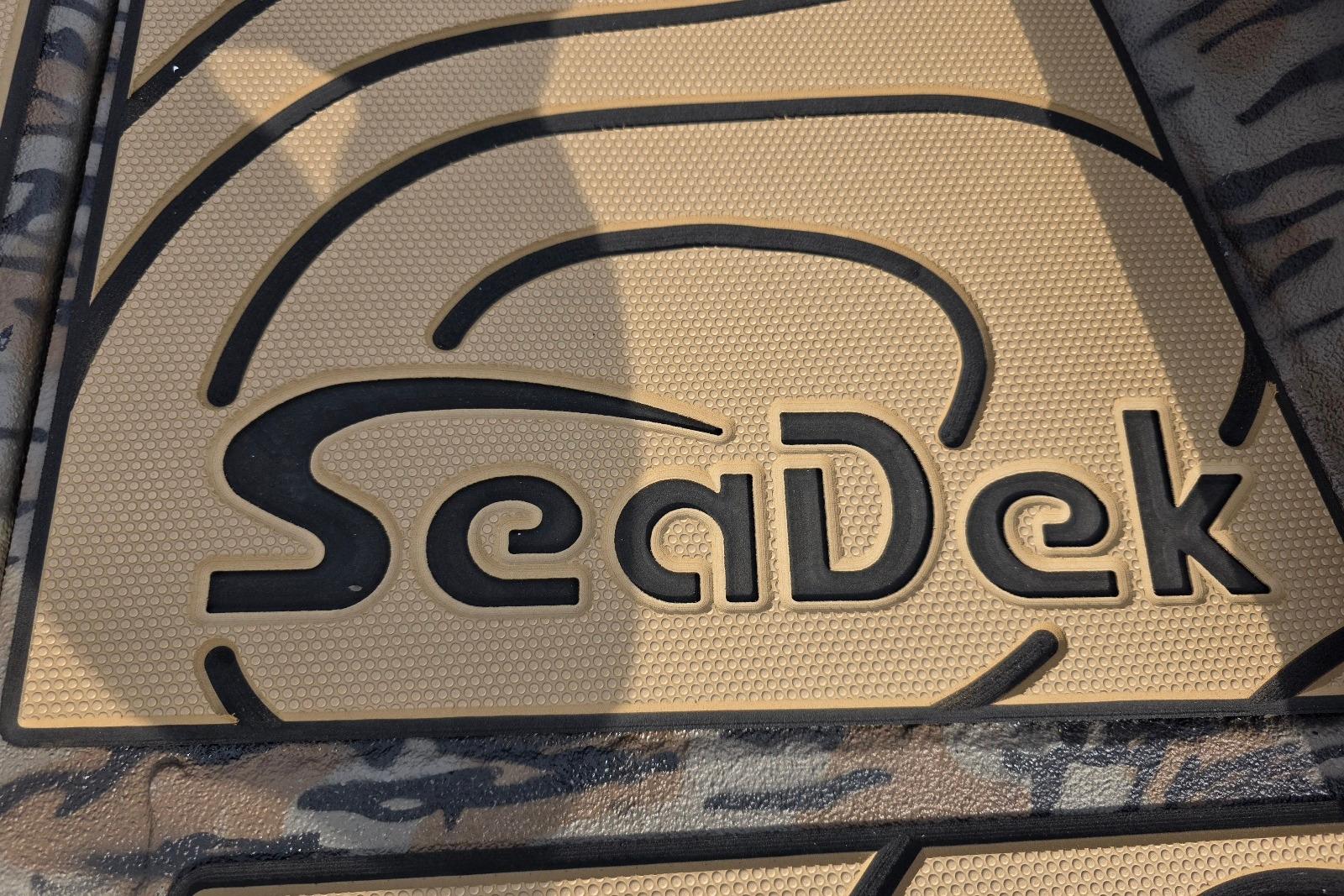 SeaDek flooring on 2026 Xpress H22B Bay boat, featuring textured design.