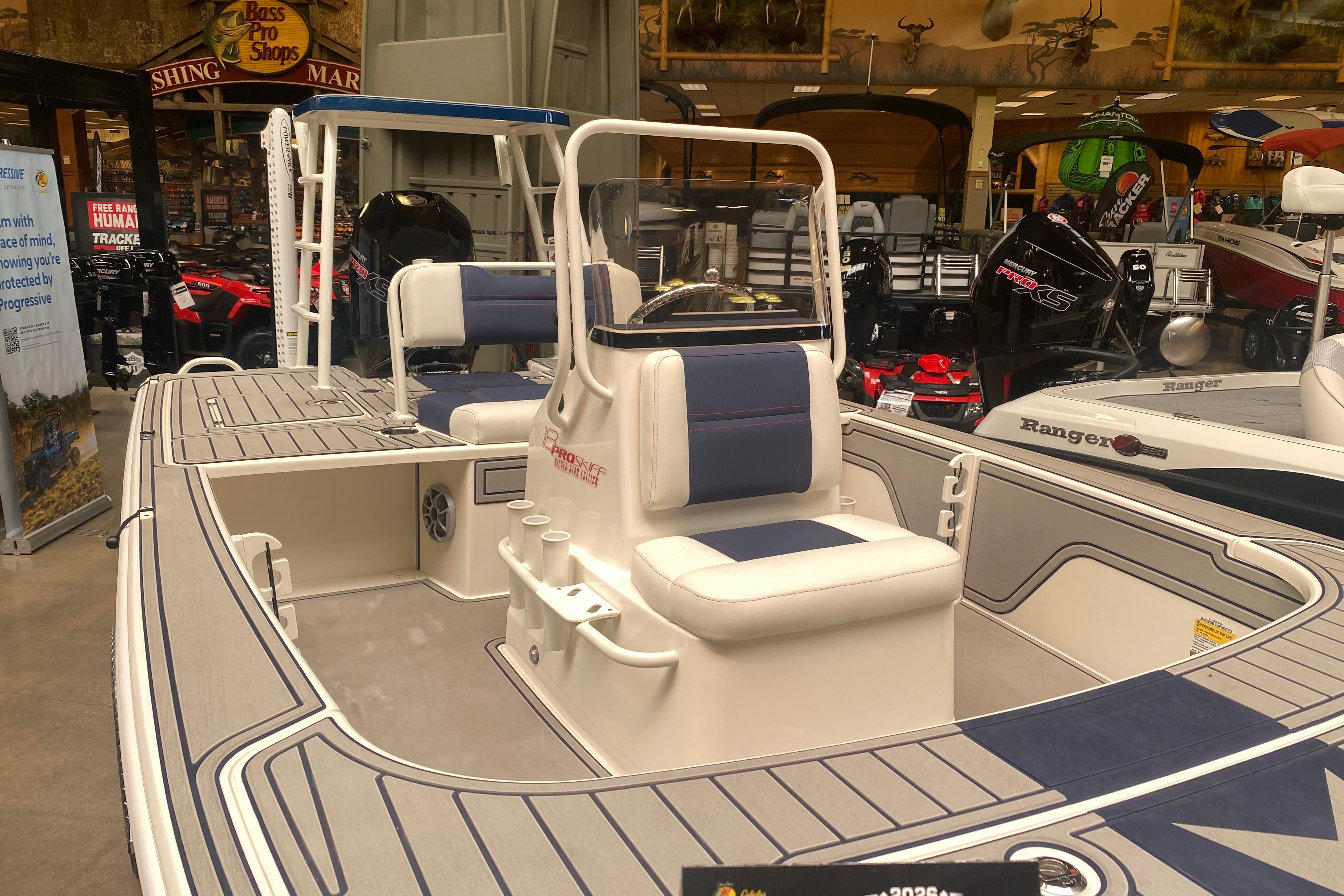 2025 Mako 18 Pro Skiff Patriot Edition displayed at Bass Pro Shops.