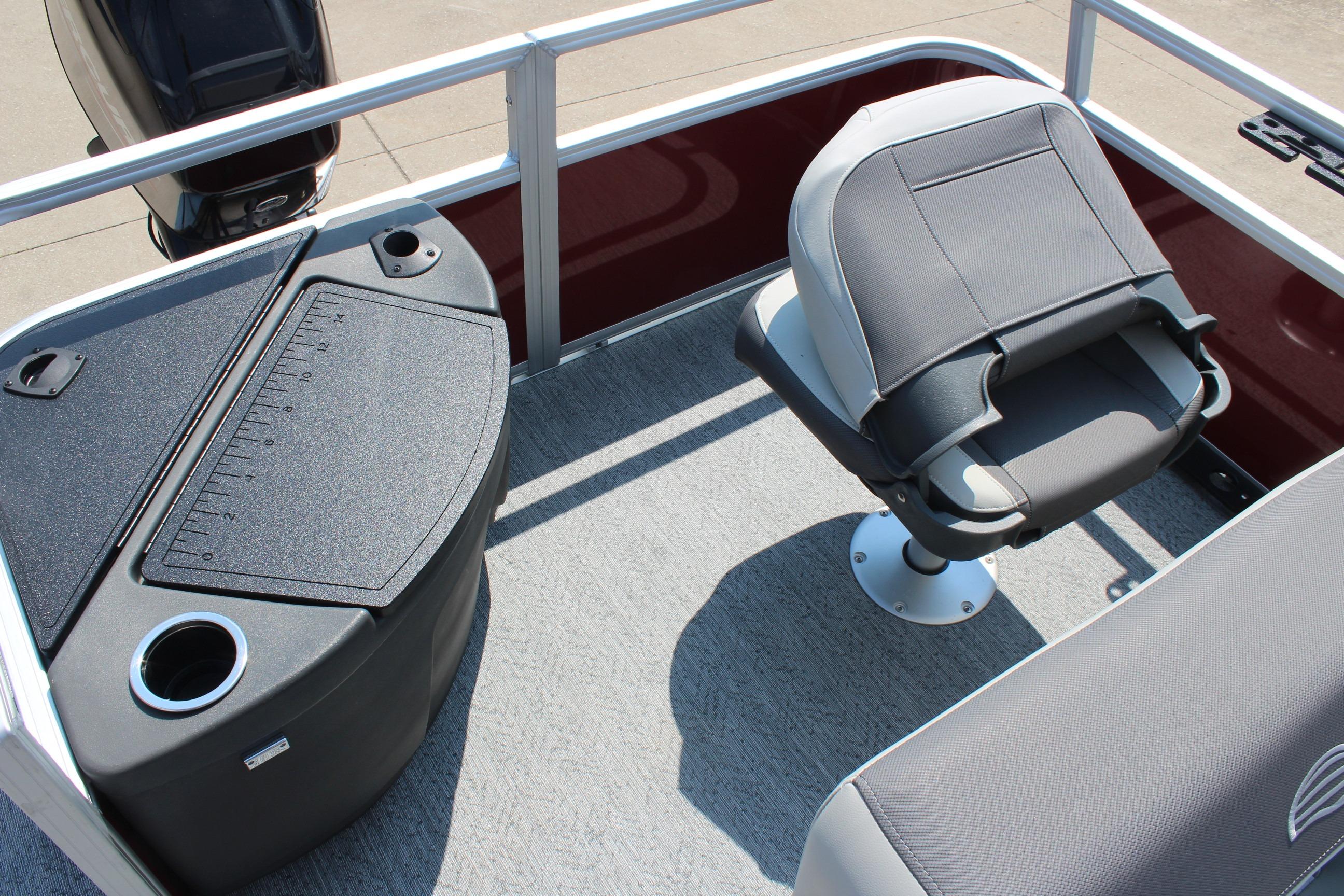 2026 Sun Tracker Bass Buggy 18 DLX boat interior with seating and fishing station.
