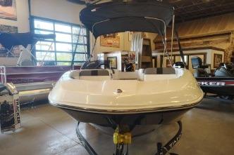 2026 Tahoe T16 boat in showroom, front view with canopy.