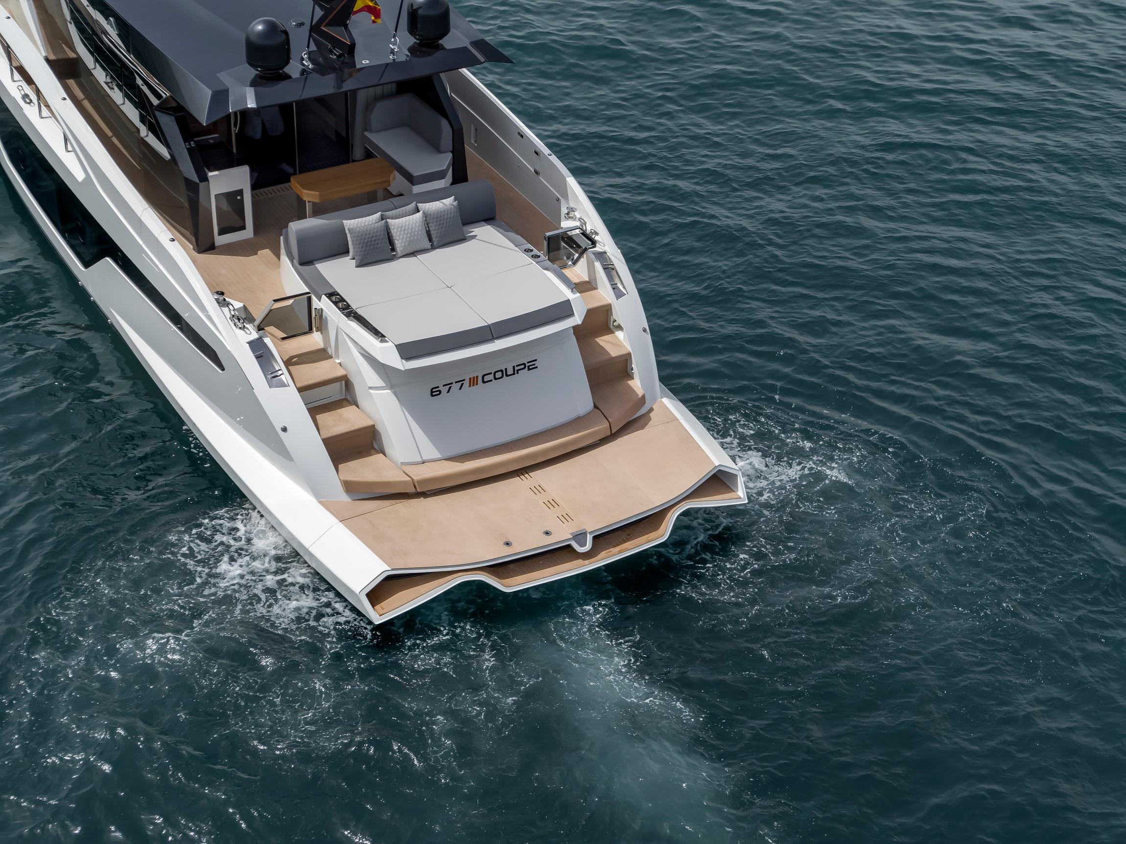Astondoa 677 Coupe 2025 yacht cruising on open water, showcasing sleek design and luxury features.