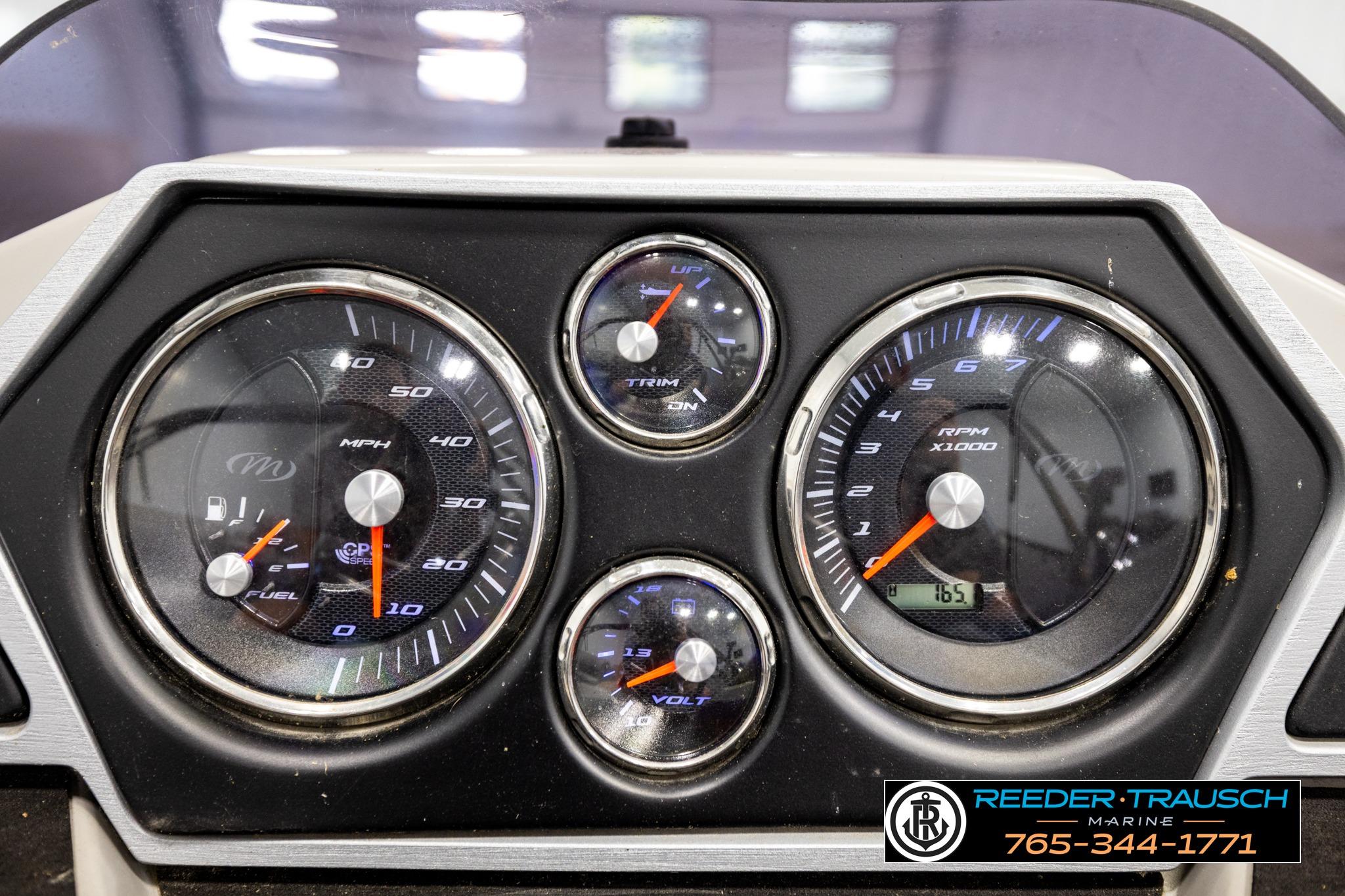Dashboard of a 2019 Manitou Oasis SR VP boat with speedometer and RPM gauges.